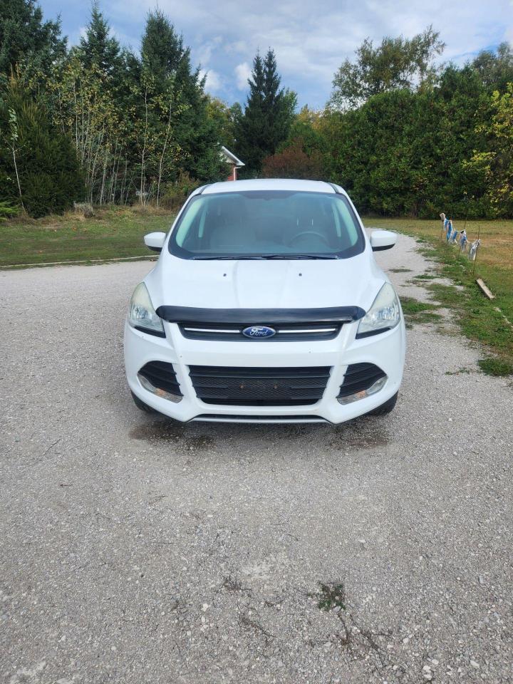 <p>2013 ford escape ALL WHEEL DRIVE runs and drives excellent and very clean inside and out price shown includes certification safety and 6 months 10,000km warranty can be extended. For more information feel free to contact Erics Autos we are located midway between barrie and orillia on hwy 11 south at the 5th line of Oro-Medonte 705 487 2277 </p>