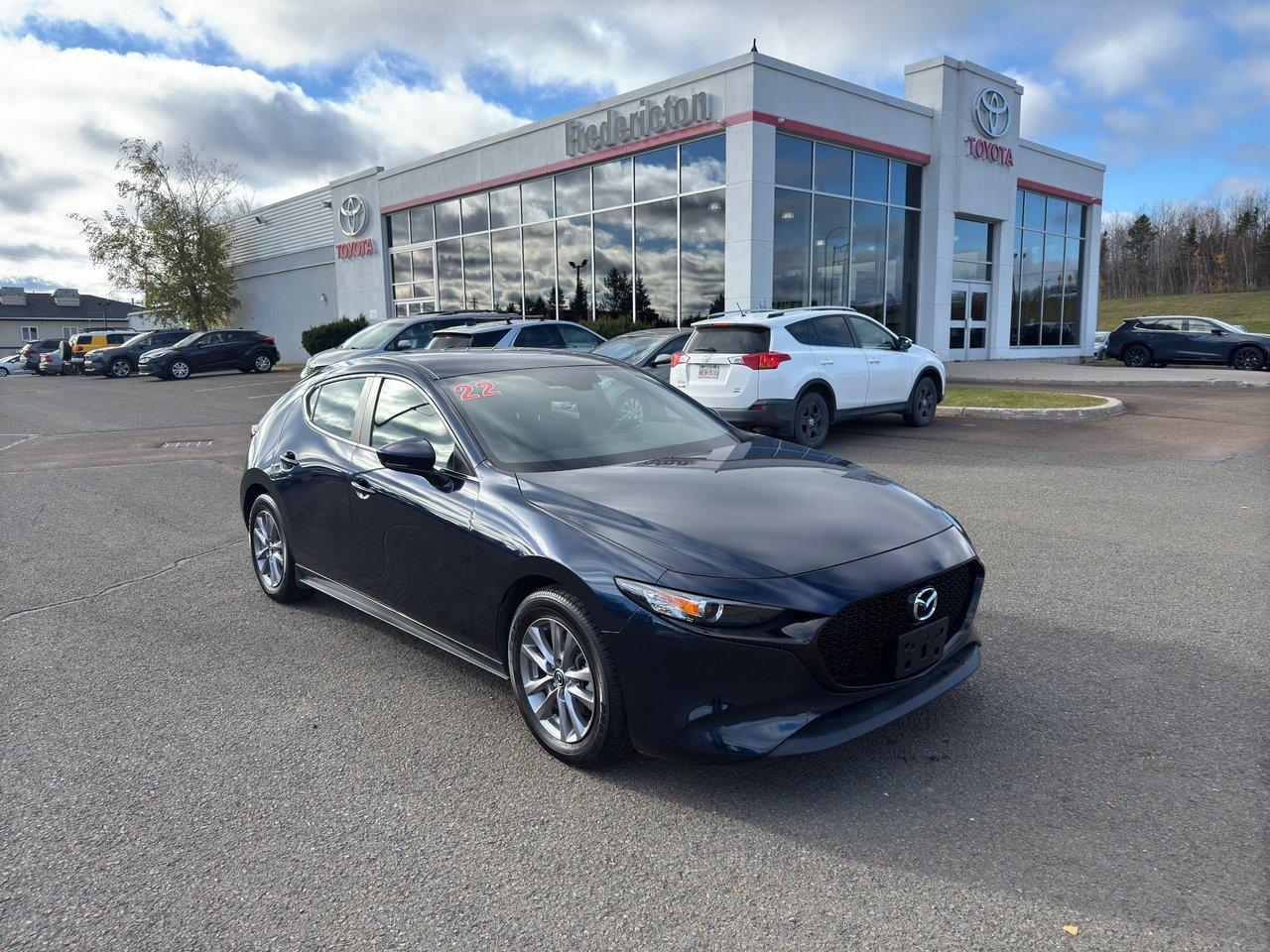 This Deep Crystal Blue Mica colored Mazda3 Sport model features heated front seats, bucket seats, cloth interior, rain sensor wipers, aluminum tires and more giving you the sport feel. Safety features include ABS, Brake Assist, Cross Traffic Alert, Blind Spot Monitor and much more! This vehicle ensures a comfortable and safe ride to all your destinations. The engine is a 4 cylinder 2.0L. Hatchback style with low mileage!