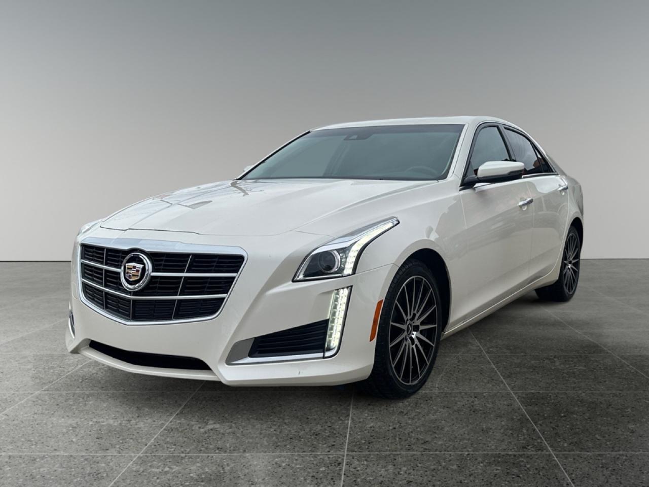 Let the Cadillac CTS exceed your expectations for a North American luxury sport sedan. This  2014 Cadillac CTS is for sale today. <br> <br>The new for 2014 Cadillac CTS has a more flowing and elegant design. Thanks to this up-sizing, the 2014 Cadillac CTS is now a true midsize sedan - an improvement over its predecessor. Styling is largely an evolution of the outgoing model; the restyled grille is simultaneously more slender and more aggressive, and the Caddys new LED running lights are striking. Step inside and you might forget youre in a North American luxury car. This CTS is a strong competitor in the midsize luxury market. This  sedan has 104,701 kms. Its  white in colour  . It has a 6 speed automatic transmission and is powered by a  321HP 3.6L V6 Cylinder Engine.  It may have some remaining factory warranty, please check with dealer for details. <br> <br/><br> Buy this vehicle now for the lowest bi-weekly payment of <b>$145.09</b> with $0 down for 72 months @ 5.99% APR O.A.C. ( Plus applicable taxes -  Plus applicable fees   ).  See dealer for details. <br> <br><br> We know that you have high expectations, and as car dealers, we enjoy the challenge of meeting and exceeding those standards each and every time. Allow us to demonstrate our commitment to excellence! </br>

<br> As your one stop shop for quality pre owned vehicles and hassle free auto financing in Saskatoon, we provide the following offers & incentives for our valued clients in Saskatchewan, Alberta & Manitoba. </br> o~o