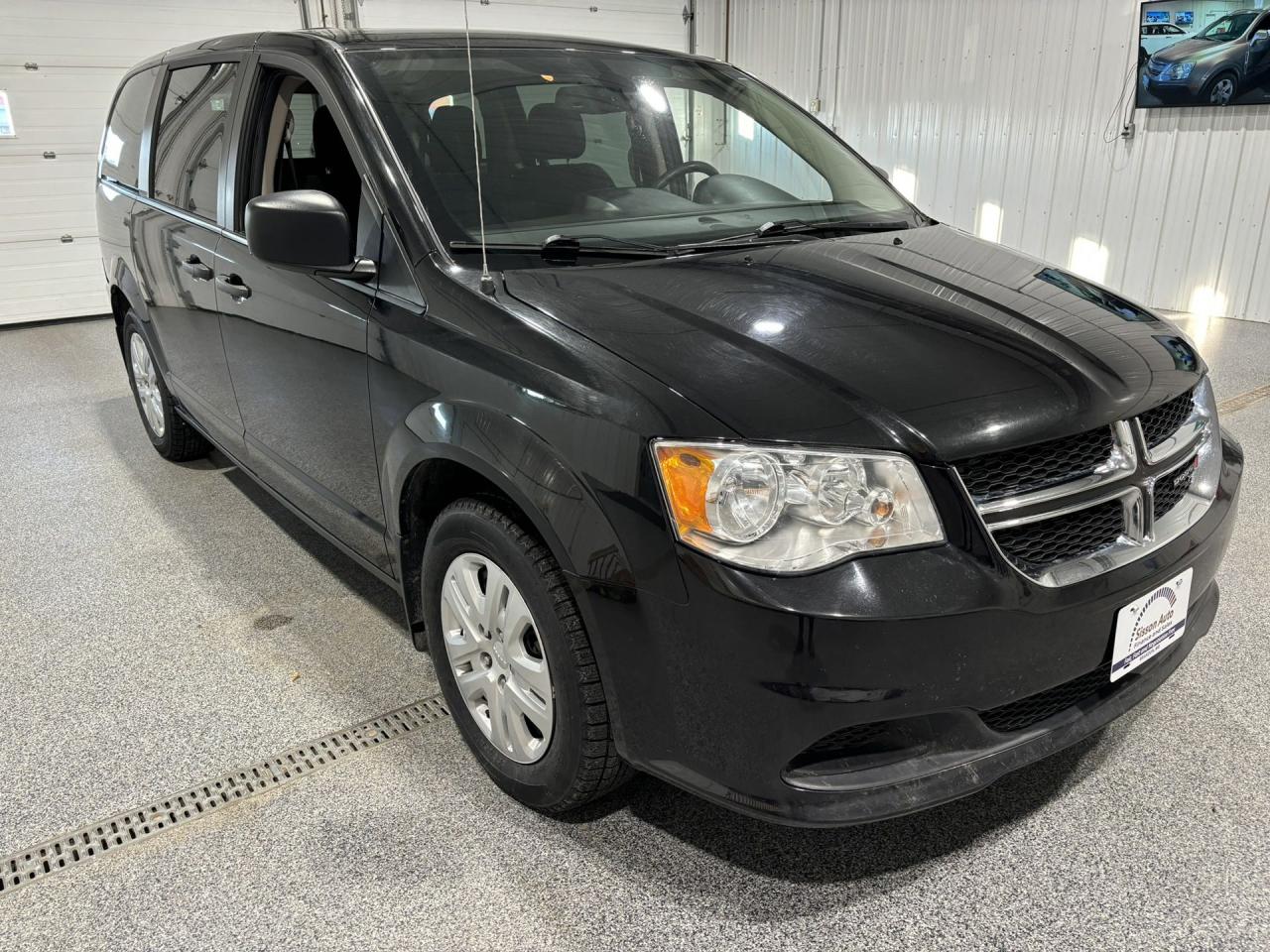 <div>Dont miss out on this incredible performance! </div><br /><div><span> The 2018 Dodge Grand Caravan SE boasts a powerful 3.6L Pentastar engine paired with a smooth 6-speed automatic transmission. </span><span>. With its sleek light greystone interior and black cloth seats, youll ride in comfort and style. </span><span> Plus, it comes equipped with four brand new tires, ensuring a safe and reliable ride in any weather!</span><br></div><br /><div> Enjoy the convenience of a rear backup camera for easy parking, and stay comfortable year-round with tri-zone manual temperature control.  The <span>second-row bench seats</span><span> and </span>versatile rear stow n go seating<span> with a 40/60 split make it perfect for family trips or hauling gear.  Keyless entry, power windows, and steering wheel-mounted audio controls add to the ease of your drive, while trailer sway control keeps everything secure. Dont waitthis Grand Caravan is ready for your next adventure! </span></div><br /><div><span>Includes Sisson Auto Certified 3 month 6000km Powertrain Warranty with 24 hour roadside assistance </span><br></div><br /><div>At Sisson Auto, we make buying a vehicle a seamless and stress-free experience. Our transparent pricing eliminates haggling and eliminates any hidden fees. To give you peace of mind, we offer a 3-day/600 km No-Hassle Return Policy, a 30-day exchange privilege, minimum warranties with 24-hour roadside assistance, a check for safety recalls, and a complimentary CarFax history report. Plus, home delivery is free within 200 km. Dealer permit #5471.    <o:p></o:p></div><br /><div>  </div><br /><div><span>** This description was written by AI based on information provided about the vehicle. AI can sometimes produce incorrect information. Please confirm all details with the dealership.</span><br></div>