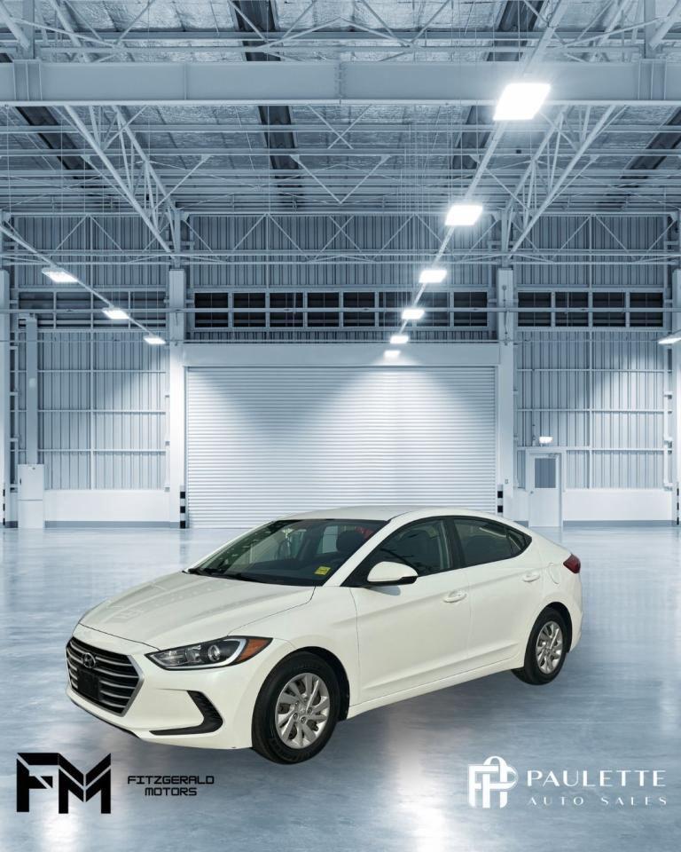 <p>Looking for a reliable and affordable sedan? Look no further than this 2017 Hyundai Elantra at Stephen Fitzgerald Motors. This white 4-door sedan comes with an automatic transmission, 4-cylinder engine, and front-wheel drive. With just 119,271 kilometers on the odometer, this Elantra is ready to take you wherever you need to go.</p><p>Enjoy a comfortable ride with heated front seats, heated mirrors, and power-adjustable seats. Stay connected with the AM/FM radio, auxiliary audio input, and steering wheel audio controls. And dont worry about winter weather with the rear window defroster and variable speed intermittent wipers.</p><p>This Elantra is loaded with safety features, including anti-lock brakes, brake assist, traction control, stability control, and multiple airbags. It also comes with keyless entry, power locks, power windows, and power mirrors for added convenience.</p><p>Here are five of the most exciting features this Hyundai Elantra has to offer:</p><ul><li><strong>Heated front seats:</strong> Stay warm and comfortable even on the coldest days.</li><li><strong>Heated mirrors:</strong> Clear vision in any weather.</li><li><strong>Power windows:</strong> Convenient one-touch operation for all windows.</li><li><strong>Keyless entry:</strong> Unlock your car without ever having to fumble with your keys.</li><li><strong>Steering wheel audio controls:</strong> Keep your hands on the wheel while controlling your music.</li></ul><p> </p>