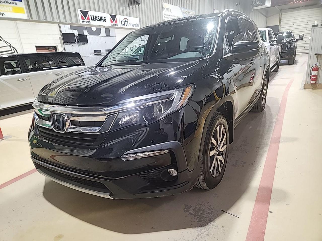 <p>Looking for a spacious and reliable SUV with all the bells and whistles? Look no further than this 2020 Honda Pilot EX AWD, now available at Stephen Fitzgerald Motors. This sleek black SUV boasts a powerful 6-cylinder engine, offering a smooth and comfortable ride for the whole family. With its 93,520km on the odometer, this Pilot is just getting broken in and ready for many more adventures.</p><p>The EX trim level comes equipped with an impressive array of features, ensuring a safe, convenient, and enjoyable driving experience. Enjoy heated seats during those chilly Canadian mornings, and keep everyone comfortable with the climate control system. Stay safe with features like lane departure warning and lane keeping assist, and navigate with ease thanks to the backup camera and power drivers seat. Plus, the third-row seating provides extra space for passengers or cargo, making this Pilot perfect for families or those who need extra room.</p><p>This 2020 Honda Pilot EX AWD is packed with features that make it a standout choice in the SUV market. To see it for yourself, visit Stephen Fitzgerald Motors today!</p><p>Here are five features that add sizzle to this Honda Pilot EX AWD:</p><ol><li><strong>Third-Row Seating</strong>: This Pilot offers extra space and flexibility with its third-row seating, perfect for families or those who need extra room for passengers or cargo.</li><li><strong>Heated Front Seats</strong>: Enjoy luxurious comfort on chilly mornings with the heated front seats.</li><li><strong>Lane Departure Warning & Lane Keeping Assist</strong>: Stay safe on the road with these advanced safety features that help prevent accidents.</li><li><strong>Backup Camera</strong>: Make parking a breeze with the convenience of a rearview camera.</li><li><strong>Power Drivers Seat</strong>: Find your perfect driving position with ease thanks to the power-adjustable drivers seat.</li></ol><p> </p>