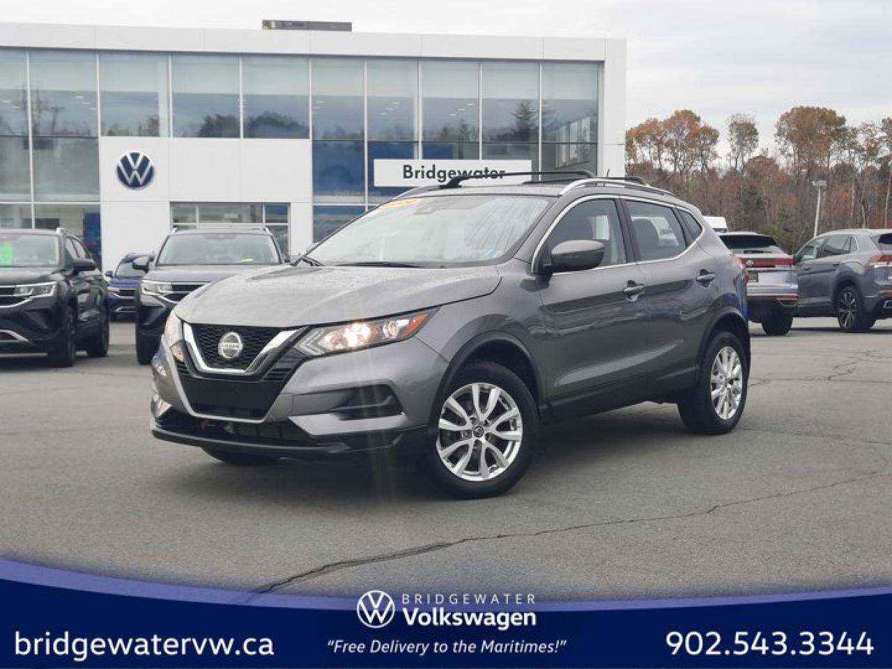 New Price! Gray 2020 Nissan Qashqai S Apple CarPlay | Android Auto | Sirus XM FWD CVT with Xtronic 2.0L DOHC Bridgewater Volkswagen, Located in Bridgewater Nova Scotia.4-Wheel Disc Brakes, ABS brakes, Air Conditioning, AM/FM radio: SiriusXM, Auto High-beam Headlights, Blind Spot Warning, Brake assist, Bumpers: body-colour, CD player, Cloth Seat Trim, Delay-off headlights, Driver door bin, Driver vanity mirror, Dual front impact airbags, Dual front side impact airbags, Electronic Stability Control, Four wheel independent suspension, Front anti-roll bar, Front Bucket Seats, Front reading lights, Full Tank of Fuel & Floor Mats, Fully automatic headlights, Heated door mirrors, Heated front seats, Illuminated entry, Knee airbag, Low tire pressure warning, NissanConnect featuring Apple CarPlay and Android Auto, Occupant sensing airbag, Outside temperature display, Overhead airbag, Overhead console, Panic alarm, Passenger door bin, Passenger vanity mirror, Power door mirrors, Power steering, Power windows, Quick Comfort Heated Front Seats, Radio data system, Rear anti-roll bar, Rear Parking Sensors, Rear side impact airbag, Rear window defroster, Rear window wiper, Remote keyless entry, Speed-Sensitive Wipers, Split folding rear seat, Spoiler, Sport steering wheel, Steering wheel mounted audio controls, Tachometer, Telescoping steering wheel, Tilt steering wheel, Traction control, Trip computer, Turn signal indicator mirrors, Variably intermittent wipers.Certification Program Details: 150 Points Inspection Fresh Oil Change Free Carfax Full Detail 2 years MVI Full Tank of Gas The 150+ point inspection includes: Engine Instrumentation Interior components Pre-test drive inspections The test drive Service bay inspection Appearance Final inspectionReviews:* The Qashqais high-end features were sometimes-pricey add-ons, but most owners say theyre worth the investment, with the parking camera system and premium stereo system in particular being among the favourites. Compact manoeuvrability and all-weather confidence were noted, as were approachable safety and connectivity features. Source: autoTRADER.ca