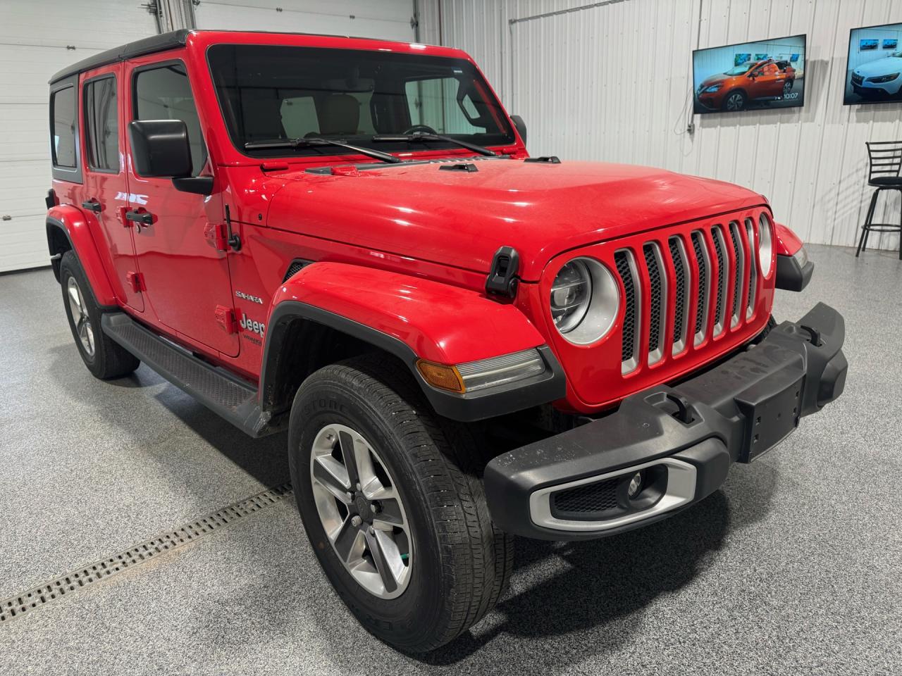 <div>Unstoppable Spirit: 2018 Jeep Wrangler Unlimited <span></span><o:p></o:p></div><br /><div>Get ready to conquer the road with this 2018 Jeep Wrangler Unlimited! Powered by a robust 3.6L Pentastar V6 engine and an 8-speed automatic transmission, this beast is designed for adventure. Enjoy the convenience of a rear view backup camera and Keyless Enter n Go with push-button start, making every drive effortless. With a front stabilizer bar for enhanced stability, you can tackle any terrain with confidence.<o:p></o:p></div><br /><div>Step inside to experience the luxury of leather-faced bucket seats and heated front seats, ensuring your comfort no matter the weather. Stay connected with Apple CarPlay and Android Auto, and enjoy your favorite tunes through the Alpine premium audio system. The Uconnect 7-inch display makes navigation a breeze, while air conditioning keeps you cool on hot summer days. Need extra cargo space? The rear 60/40 split folding seat offers versatility for all your gear. Plus, with the Black Jeep Freedom Top hard top, youre protected from the elements, and the heated steering wheel adds an extra touch of comfort.<o:p></o:p></div><br /><div>      </div><br /><div>Whether youre hitting the trails or cruising through the city, this Jeep Wrangler Unlimited is your perfect companion. Dont miss out on the adventuredrive away with your Unstoppable Spirit today! <span></span></div><br /><div><span>Includes Sisson Auto Certified 3 month 6000km Powertrain Warranty with 24 hour roadside assistance </span></div><br /><div>At Sisson Auto, we make buying a vehicle a seamless and stress-free experience. Our transparent pricing eliminates haggling and eliminates any hidden fees. To give you peace of mind, we offer a 3-day/600 km No-Hassle Return Policy, a 30-day exchange privilege, minimum warranties with 24-hour roadside assistance, a check for safety recalls, and a complimentary CarFax history report. Plus, home delivery is free within 200 km. Dealer permit #5471.    <o:p></o:p></div><br /><div><span>  </span><span></span><o:p></o:p></div><br /><div>** This description was written by AI based on information provided about the vehicle. AI can sometimes produce incorrect information. Please confirm all details with the dealership.<o:p></o:p></div>