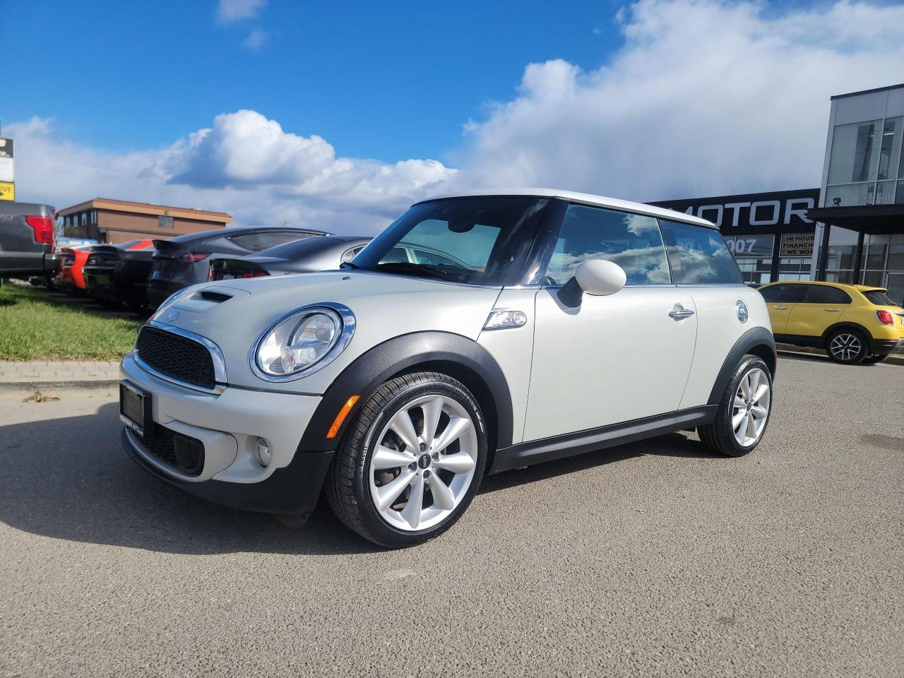 <p>REALLY SHARP CAR! SUPER FUN TO DRIVE! CLEAN CARFAX, LOCAL ONTARIO!!</p><p>Looking for a stylish and fun-to-drive compact car? Look no further than this 2012 MINI Cooper 2dr Cpe S, available now at Twin Oaks Auto! This silver beauty boasts a sleek coupe design with black interior, making a statement wherever you go. With its peppy 4-cylinder engine and smooth automatic transmission, youll enjoy a thrilling driving experience. This well-maintained MINI Cooper has only 77,400km on the odometer, ensuring youre getting a car thats still in its prime.</p><p>This MINI Cooper S is packed with features that make every drive enjoyable. The S trim level brings a level of performance and features beyond the standard Cooper, and this one is equipped with a sunroof, heated seats, and a premium sound system, turning your daily commute into a concert. Youll appreciate the convenience of Bluetooth connectivity, allowing you to stay connected while keeping your eyes on the road. And with power windows, power locks, and cruise control, this MINI Cooper offers the comfort and convenience you deserve.</p><p>This MINI Cooper 2dr Cpe S is a fantastic option for those seeking a blend of style, performance, and practicality. Stop by Twin Oaks Auto today to experience it for yourself!</p><p>THE FULL CERTIFICATION COST OF THIS VEHICLE IS AN <strong>ADDITIONAL $690+HST</strong>. THE VEHICLE WILL COME WITH A FULL VALID SAFETY AND 36 DAY SAFETY ITEM WARRANTY. THE OIL WILL BE CHANGED, ALL FLUIDS TOPPED UP AND FRESHLY DETAILED. WE AT TWIN OAKS AUTO STRIVE TO PROVIDE YOU A HASSLE FREE CAR BUYING EXPERIENCE! WELL HAVE YOU DOWN THE ROAD QUICKLY!!! </p><p><strong>Financing Options Available!</strong></p><p><strong>TO CALL US 905-339-3330 </strong></p><p>We are located @ 2470 ROYAL WINDSOR DRIVE (BETWEEN FORD DR AND WINSTON CHURCHILL) OAKVILLE, ONTARIO L6J 7Y2</p><p>PLEASE SEE OUR MAIN WEBSITE FOR MORE PICTURES AND CARFAX REPORTS</p><p><span style=font-size: 18pt;>TwinOaksAuto.Com</span></p><p><em> </em></p>