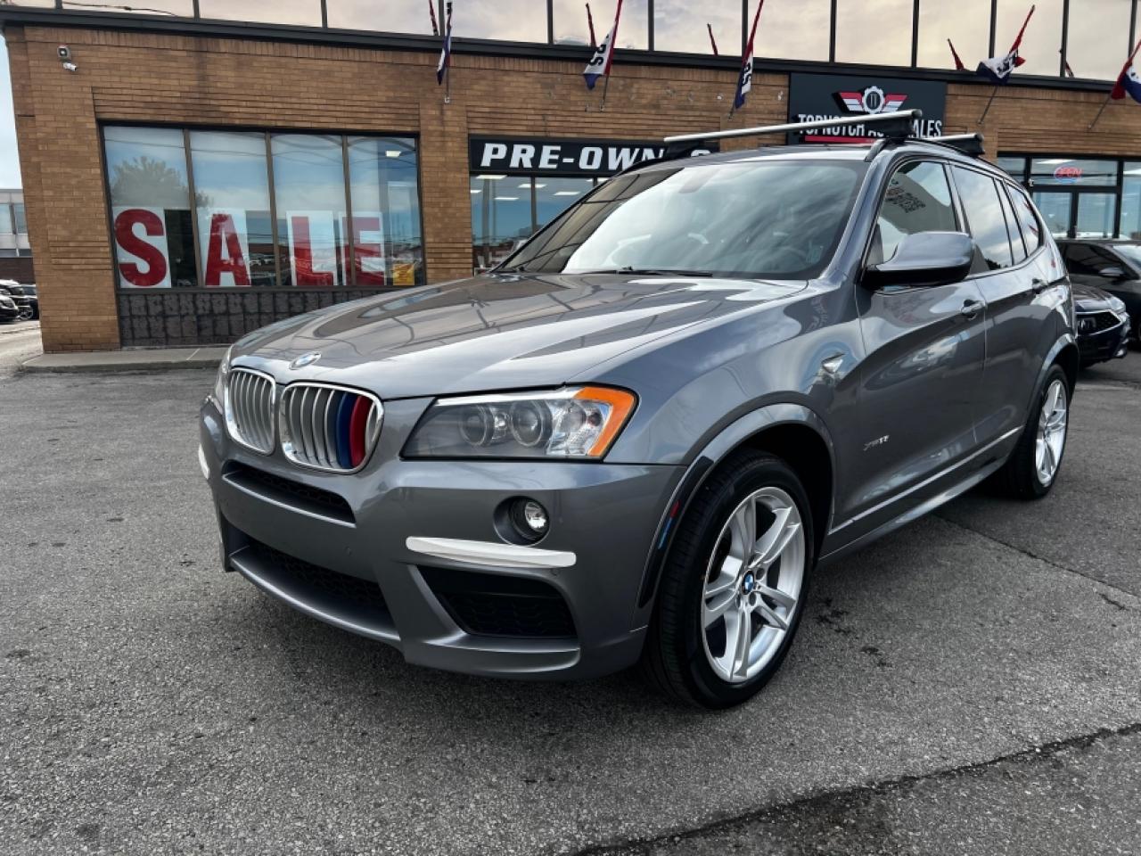 3.0L I-6 24V DOHC TwinPower Turbo Engine | Black | Black | AWD | 4 door | Sport Utility | X3 xDrive35i<br><br>Brake assist system<br>Cruise control with steering wheel mounted controls<br>Heated steering wheel<br>Heated driver and front passenger seats<br>Leatherette front seat upholstery<br>Driver seat power reclining, cushion tilt, fore/aft control and height adjustable control<br>XDrive full-time AWD<br>3L I-6 gasoline direct injection, DOHC, variable valve control, intercooled turbo, premium unleaded, engine with 300HP<br>Keyfob window control<br>Dual-zone front climate control<br>Bi-xenon high-intensity discharge low and high beam headlights<br><br>Topnotch Auto Sale is a well established dealer, being in business for well over 14 years. We pride ourselves on how we maintain relationships with our clients, making customer service our first priority. We always aim to keep our large indoor showroom stocked with a diverse inventory, containing the right car for any type of customer. If financing is needed, we provide on the spot financing on all makes and vehicle models. We welcome you to give us a call, take a look online, or come to our establishment at 5161 steeles avenue west to take a look at what we have. Looking forward to seeing you !