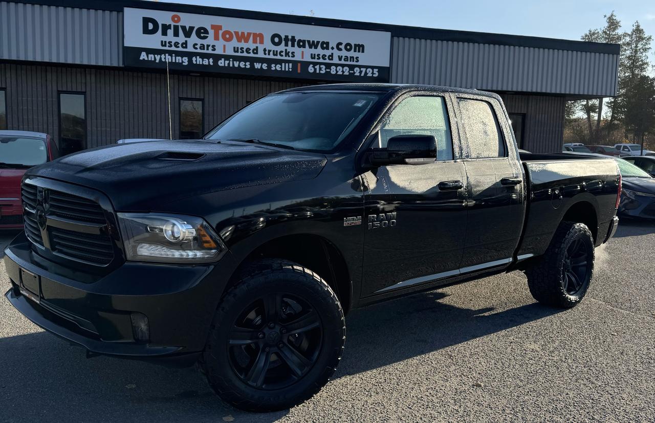 Used 2013 RAM 1500 4WD QUAD CAB 140.5