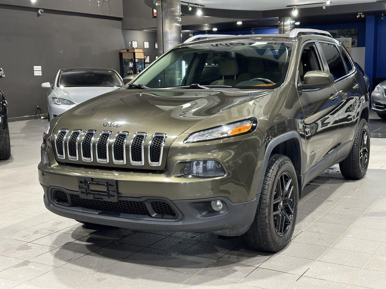 <p><strong>High Value Options:</strong></p><ul><li>North Package</li><li>Low Mileage</li><li>Navigation System</li><li>4WD</li></ul><p>The 2015 Jeep Cherokee North is a versatile and capable SUV with features designed for both comfort and performance. This model includes the North Package, which enhances the driving experience with added style and convenience. With low mileage, this Cherokee is an excellent choice for those seeking long-term reliability. Equipped with 4WD, its built to handle various terrains and weather conditions, while the navigation system ensures easy route planning on all your journeys. Known for its rugged build and dependable performance, the Jeep Cherokee North offers a blend of functionality and technology for any adventure.</p><p><strong>3 Month/5000 KM Powertrain Warranty on every vehicle!</strong> 3-month warranty price is included in the advertised price. Extended warranties available (extended warranty prices not included).</p><p>Every vehicle sold at Match is clean title. We do not sell ANY rebuilt vehicles. We also provide a verified CarFax report for each vehicle.</p><p>Financing available; please visit <a target=_blank rel=noopener noreferrer href=http://www.matchautomarket.ca><a rel=noopener target=_new><span>www.matchautomarket.ca</span></a></a>.</p><p>Dealer permit: 4858<br>Address: 231 Oak Point Hwy</p>