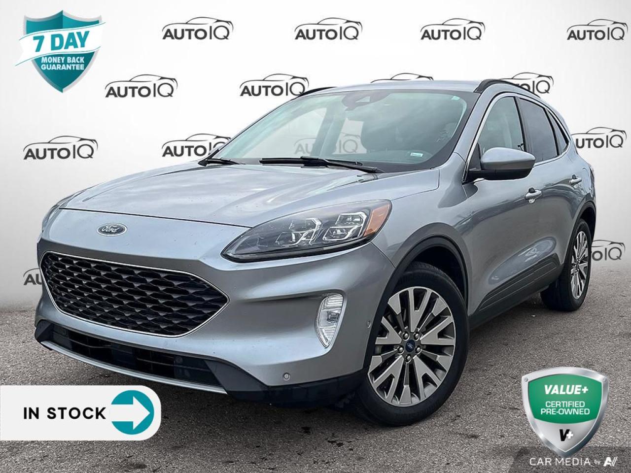 New Price Alert! 2021 Ford Escape Titanium AWD - Ready for Your Next Adventure! <br><br>Key Features Youll Love:<br><br>Remote Start: Start your car from the comfort of your home!<br><br>All-Wheel Drive (AWD): Conquer any terrain with confidence.<br><br>Premium Audio: 10 speakers and a B&O Sound System by Bang & Olufsen for immersive sound, paired with SiriusXM.<br><br>Navigation System: Arrive at every destination with ease.<br><br>Class II Trailer Tow Package: Bring along your toys with up to 3,500 lbs towing capacity.<br><br>Power Liftgate: Convenient access to the spacious cargo area.<br><br>SYNC 3 Communications & Entertainment System: Stay connected on the go with cutting-edge tech.<br><br>Steering Wheel Mounted Audio Controls: Hands on the wheel, music at your fingertips.<br><br>Performance & Style:<br><br>Powered by a 2.0L EcoBoost I4 Turbocharged Engine with an 8-Speed Automatic Transmission.<br><br>Iconic Silver Metallic exterior a head-turner in any setting.<br><br>Condition:<br><br>Meticulously maintained and ready for immediate delivery.<br><br>Act Fast! Call us today to schedule a test drive or learn more about this incredible deal.<br><br>Your next adventure awaits in the 2021 Ford Escape Titanium AWD luxury, power, and practicality in one stunning package!<br><br> Drive it home today!<p> </p>

<h4>VALUE+ CERTIFIED PRE-OWNED VEHICLE</h4>

<p>36-point Provincial Safety Inspection<br />
172-point inspection combined mechanical, aesthetic, functional inspection including a vehicle report card<br />
Warranty: 30 Days or 1500 KMS on mechanical safety-related items and extended plans are available<br />
Complimentary CARFAX Vehicle History Report<br />
2X Provincial safety standard for tire tread depth<br />
2X Provincial safety standard for brake pad thickness<br />
7 Day Money Back Guarantee*<br />
Market Value Report provided<br />
Complimentary 3 months SIRIUS XM satellite radio subscription on equipped vehicles<br />
Complimentary wash and vacuum<br />
Vehicle scanned for open recall notifications from manufacturer</p>

<p>SPECIAL NOTE: This vehicle is reserved for AutoIQs retail customers only. Please, No dealer calls. Errors & omissions excepted.</p>

<p>*As-traded, specialty or high-performance vehicles are excluded from the 7-Day Money Back Guarantee Program (including, but not limited to Ford Shelby, Ford mustang GT, Ford Raptor, Chevrolet Corvette, Camaro 2SS, Camaro ZL1, V-Series Cadillac, Dodge/Jeep SRT, Hyundai N Line, all electric models)</p>

<p>INSGMT</p>