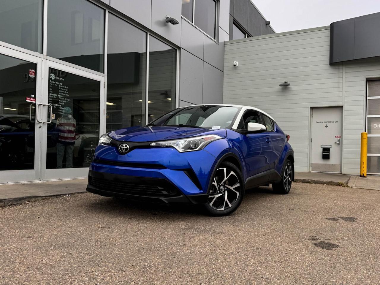 Our great looking 2020 Toyota C-HR XLE is shown off in Blue Eclipse Metallic w/White Roof! Its powered by a 2.0 Liter 4 Cylinder engine that produces 144 horsepower while paired with a CVT transmission.Its absolutely stunning with wheels, LED headlights, and a rear roof spoiler.Inside our C-HR, open the door tofind a world of comfort and convenience with all-weather mats, cloth seating, front heated seats, and a leather-wrapped heated steering wheel mounted audio/cruise controls (adaptive). Its also equipped with a spacious cargo area, dual-zone climate control, AM/FM radio thats XM radio ready, and animpressive 6 speaker sound system.Our Toyota will give you peace of mind with its wide variety of safety features including a backup camera, a forward collision/blind-spot monitoring, lane-keep assist, dusk sensing headlights, stability/traction control, an immense amount of airbags and more!Print this page and call us Now... We Know You Will Enjoy Your Test Drive Towards Ownership! We look forward to showing you why Go Mazda is the best place for all your automotive needs.Go Mazda is an AMVIC licensed business.Please note: this vehicle is showing a CarFax incident in the amount of $358.00