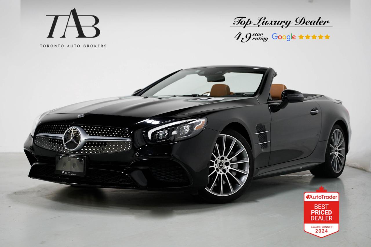 This 2019 Mercedes-Benz SL 550 is a Local Ontario Vehicle with Clean carfax Report. It is a luxurious convertible that blends elegance with powerful performance. With its 4.7L V8 engine, it delivers an exhilarating drive, while the refined interior, featuring premium materials and the unique Magic Sky Control roof, makes every journey unforgettable. The brown leather interior adds a touch of warmth and sophistication to the open-top experience, ensuring a smooth and stylish ride.

Key Features:

4.7L twin-turbo V8 engine (449 hp)
MAGIC SKY CONTROL panoramic roof
Intelligent Drive Package   $2700
Premium Package             $6900
Exclusive Package             $2800
Convertible hardtop
Brown leather interior
19-inch alloy wheels
Adaptive high-beam assist
Multicontour massaging seats
Active Body Control suspension
Premium Harman Kardon surround sound system
COMAND navigation system with 8.4-inch display
Dual-zone automatic climate control
Apple CarPlay and Android Auto integration
Heated and ventilated seats
Intelligent Drive system with adaptive cruise control
Ambient interior lighting

NOW OFFERING 3 MONTH DEFERRED FINANCING PAYMENTS ON APPROVED CREDIT.

WE OFFER THE BEST FINANCE RATES, AND DONT CHARGE ANY FINANCING FEE

Looking for a top-rated pre-owned luxury car dealership in the GTA? Look no further than Toronto Auto Brokers (TAB)! Were proud to have won multiple awards, including the 2024 AutoTrader Best Priced Dealer, 2024 CBRB Dealer Award, the Canadian Choice Award 2024, the 2024 BNS Award, the 2024 Three Best Rated Dealer Award, and many more!

With 30 years of experience serving the Greater Toronto Area, TAB is a respected and trusted name in the pre-owned luxury car industry. Our 30,000 sq.Ft indoor showroom is home to a wide range of luxury vehicles from top brands like BMW, Mercedes-Benz, Audi, Porsche, Land Rover, Jaguar, Aston Martin, Bentley, Maserati, and more. 

At TAB, were committed to providing a no-pressure environment and honest work ethics. As a family-owned and operated business, we treat every customer like family and ensure that every interaction is a positive one. Come experience the TAB Lifestyle at its truest form, luxury car buying has never been more enjoyable and exciting!

We offer a variety of services to make your purchase experience as easy and stress-free as possible. From competitive and simple financing and leasing options to extended warranties, aftermarket services, and full history reports on every vehicle, we have everything you need to make an informed decision. We welcome every trade, even if youre just looking to sell your car without buying, and when it comes to financing or leasing, we offer same day approvals, with access to over 50 lenders, including all of the banks in Canada. Feel free to check out your own Equifax credit score without affecting your credit score, simply click on the Equifax tab above and see if you qualify.

So if youre looking for a luxury pre-owned car dealership in Toronto, look no further than TAB! We proudly serve the GTA, including Toronto, Etobicoke, Woodbridge, North York, York Region, Vaughan, Thornhill, Richmond Hill, Mississauga, Scarborough, Markham, Oshawa, Peteborough, Hamilton, Newmarket, Orangeville, Aurora, Brantford, Barrie, Kitchener, Niagara Falls, Oakville, Cambridge, Kitchener, Waterloo, Guelph, London, Windsor, Orillia, Pickering, Ajax, Whitby, Durham, Cobourg, Belleville, Kingston, Ottawa, Montreal, Vancouver, Winnipeg, Calgary, Edmonton, Regina, Halifax, and more.

Call us today or visit our website to learn more about our inventory and services. And remember, all prices exclude applicable taxes and licensing, and vehicles can be certified at an additional cost of $799.