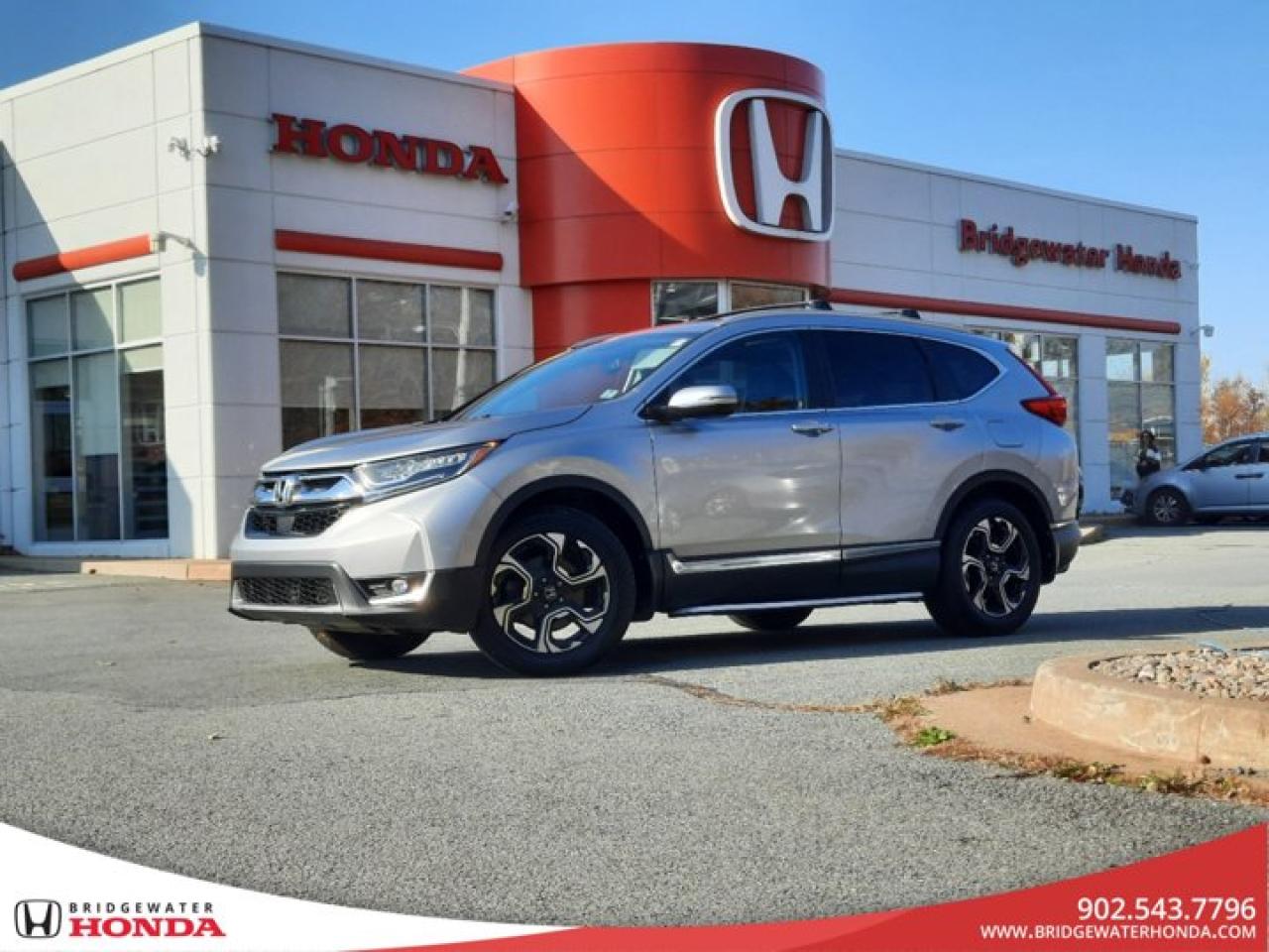 Awards:* ALG Canada Residual Value Awards Recent Arrival! One Owner!! Silver 2019 Honda CR-V Touring AWD CVT 1.5L I4 Turbocharged DOHC 16V LEV3-ULEV70 190hp Bridgewater Honda, Located in Bridgewater Nova Scotia.Remote Starter, AWD, 18 Aluminum Alloy Wheels, 4-Wheel Disc Brakes, 9 Speakers, Air Conditioning, Alloy wheels, AM/FM radio: SiriusXM, Apple CarPlay/Android Auto, Auto High-beam Headlights, Auto-dimming Rear-View mirror, Automatic temperature control, Backup Camera, Cruise Control, Delay-off headlights, Four wheel independent suspension, Front Bucket Seats, Front dual zone A/C, Front fog lights, Fully automatic headlights, Garage door transmitter: HomeLink, Heated door mirrors, Heated Front Bucket Seats, Heated front seats, Heated rear seats, Heated steering wheel, Honda Satellite-Linked Navigation System, Illuminated entry, Leather Shift Knob, Memory seat, Perforated Leather-Trimmed Seating Surfaces, Power door mirrors, Power driver seat, Power Liftgate, Power moonroof, Power passenger seat, Power steering, Power windows, Radio data system, Radio: 331-Watt AM/FM Premium Audio System, Rain sensing wipers, Rear anti-roll bar, Rear window defroster, Rear window wiper, Remote keyless entry, Roof rack: rails only, SiriusXM, Speed-sensing steering, Speed-Sensitive Wipers, Split folding rear seat, Spoiler, Steering wheel mounted audio controls, Telescoping steering wheel, Tilt steering wheel, Traction control, Turn signal indicator mirrors, Variably intermittent wipers.