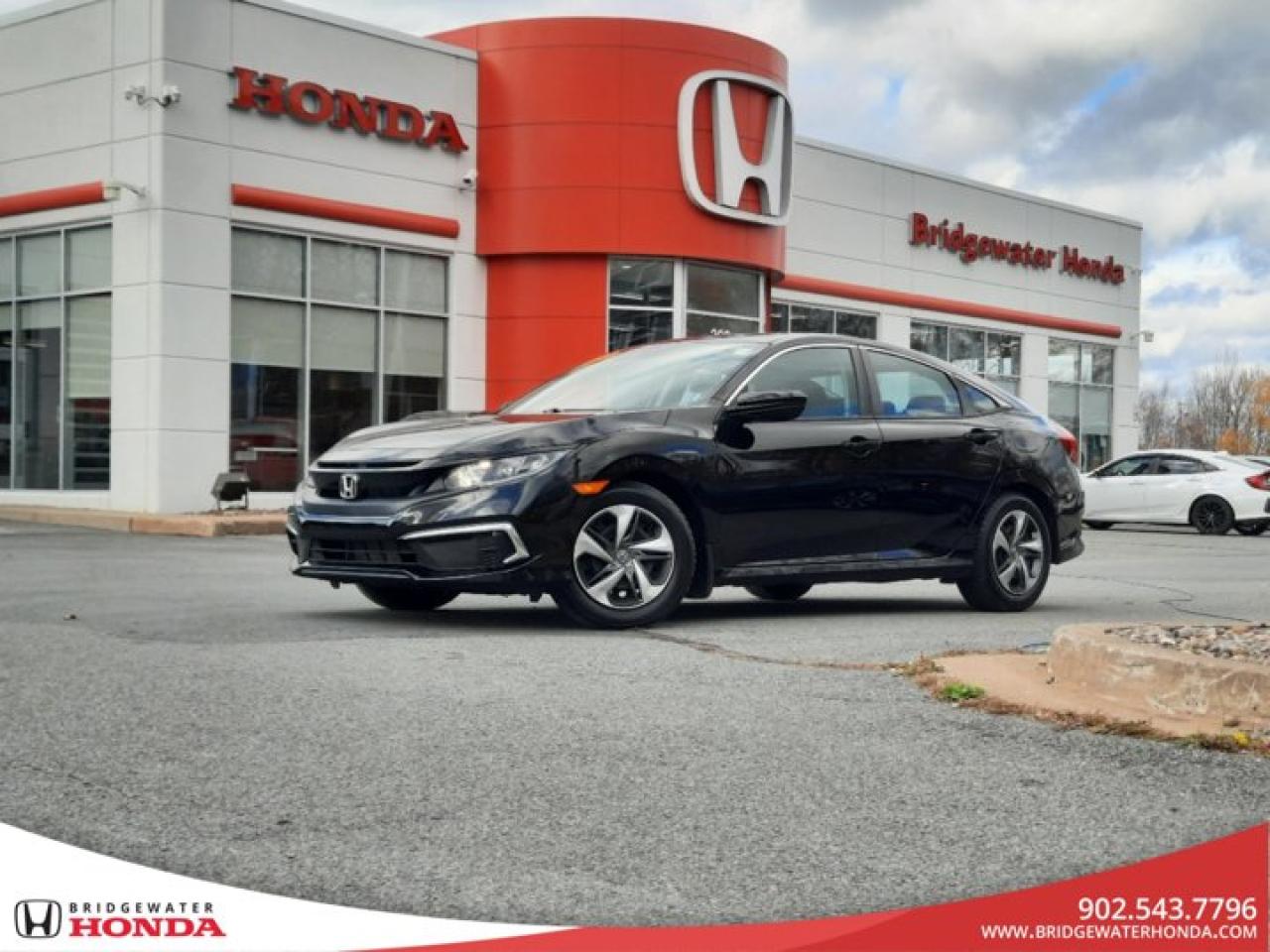 One Owner!! Serviced At Dealership! Recent Arrival! Odometer is 31506 kilometers below market average! Nh731p 2020 Honda Civic LX FWD CVT 2.0L I4 DOHC 16V i-VTEC Bridgewater Honda, Located in Bridgewater Nova Scotia.Black Cloth, 16 Steel Wheels w/Full Covers, 4-Wheel Disc Brakes, ABS brakes, Air Conditioning, Apple CarPlay/Android Auto, Auto High-beam Headlights, Automatic temperature control, Backup Camera, Brake assist, Cruise Control, Delay-off headlights, Electronic Stability Control, Fabric Seating Surfaces, Forward collision: Collision Mitigation Braking System (CMBS) + FCW mitigation, Four wheel independent suspension, Front Bucket Seats, Front reading lights, Fully automatic headlights, Heated door mirrors, Heated Front Bucket Seats, Illuminated entry, Lane departure: Lane Keeping Assist System (LKAS) active, Power door mirrors, Power steering, Power windows, Radio: 180-Watt AM/FM Audio System, Rear window defroster, Remote keyless entry, Speed-sensing steering, Split folding rear seat, Steering wheel mounted audio controls, Telescoping steering wheel, Tilt steering wheel, Traction control.Reviews:* This generation of Civic attracted shoppers with Hondas reputation for safety and reliability, and many owners report that good looks, a thoughtful and handy interior, and plenty of feature content for the money helped seal the deal. Headlight performance is highly rated, as is a smooth and punchy performance from the turbocharged engine. Source: autoTRADER.ca