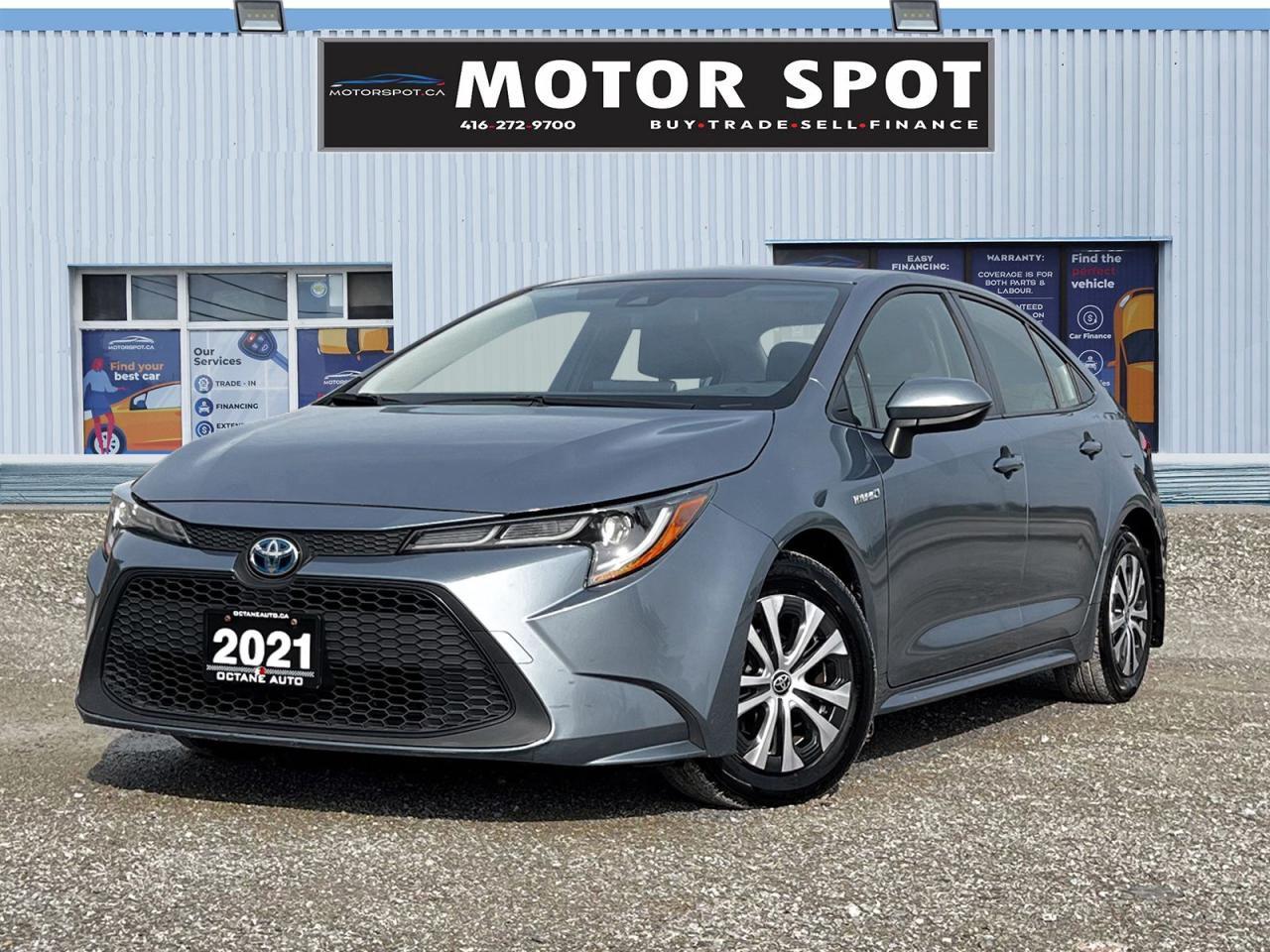 <div><font color=#242424><span>2021 Toyota Corolla Hybrid In Great Condition! Rear View Camera! Radar Cruise Control! Collision Assist! Lane Departure Assist! Heated Seats! Push Button Start! And Much More!</span></font></div><br /><div><span>Welcome to Motor Spot! Conveniently located at 1933 Kennedy Rd, Scarborough, ON M1P 2L9, were dedicated to providing you with a seamless car-buying experience. Heres what sets us apart:</span></div><div><font color=#242424><span>**Certification:** Ensure your peace of mind with our comprehensive certification process. Each pre-owned vehicle undergoes a rigorous safety inspection, exceeding industry standards. Our service includes an oil change and professional detailing before delivery. Vehicles are not drivable, if not certified and not e-tested, a certification package is available for $699. We also welcome trade-ins, and taxes and licensing are additional.</span></font></div><div><font color=#242424 face=Segoe UI, Segoe UI Web (West European), Segoe UI, -apple-system, BlinkMacSystemFont, Roboto, Helvetica Neue, sans-serif><span><br /></span></font></div><div><font color=#242424 face=Segoe UI, Segoe UI Web (West European), Segoe UI, -apple-system, BlinkMacSystemFont, Roboto, Helvetica Neue, sans-serif><span>**Financing:** No matter your credit history, our finance and credit experts are here to help. Whether youre dealing with no credit, bankruptcy, consumer proposal, or collections, we specialize in securing approvals and starting your journey to rebuilding credit. Financing deals are subject to an Admin fee, and we offer on-the-spot financing with instant approvals.</span></font></div><div><font color=#242424 face=Segoe UI, Segoe UI Web (West European), Segoe UI, -apple-system, BlinkMacSystemFont, Roboto, Helvetica Neue, sans-serif><span><br /></span></font></div><div><font color=#242424 face=Segoe UI, Segoe UI Web (West European), Segoe UI, -apple-system, BlinkMacSystemFont, Roboto, Helvetica Neue, sans-serif><span>**Warranty:** Rest assured knowing your vehicle is eligible for an extended warranty. We offer various terms and coverages to suit your needs. Our team is ready to assist you in selecting the right warranty option.</span></font></div><div><font color=#242424 face=Segoe UI, Segoe UI Web (West European), Segoe UI, -apple-system, BlinkMacSystemFont, Roboto, Helvetica Neue, sans-serif><span><br /></span></font></div><div><font color=#242424 face=Segoe UI, Segoe UI Web (West European), Segoe UI, -apple-system, BlinkMacSystemFont, Roboto, Helvetica Neue, sans-serif><span>**Pricing:** At Motor Spot, we believe in fair and transparent pricing. Say goodbye to negotiationswe constantly monitor the market and adjust our prices below the market average to provide you with the best value. Enjoy a hassle-free buying experience with us and avoid paying more elsewhere.</span></font></div><div><font color=#242424 face=Segoe UI, Segoe UI Web (West European), Segoe UI, -apple-system, BlinkMacSystemFont, Roboto, Helvetica Neue, sans-serif><span><br /></span></font></div><div><font color=#242424 face=Segoe UI, Segoe UI Web (West European), Segoe UI, -apple-system, BlinkMacSystemFont, Roboto, Helvetica Neue, sans-serif><span>Visit us today or contact our team for more information. Your satisfaction is our priority at Motor Spot!</span></font></div>