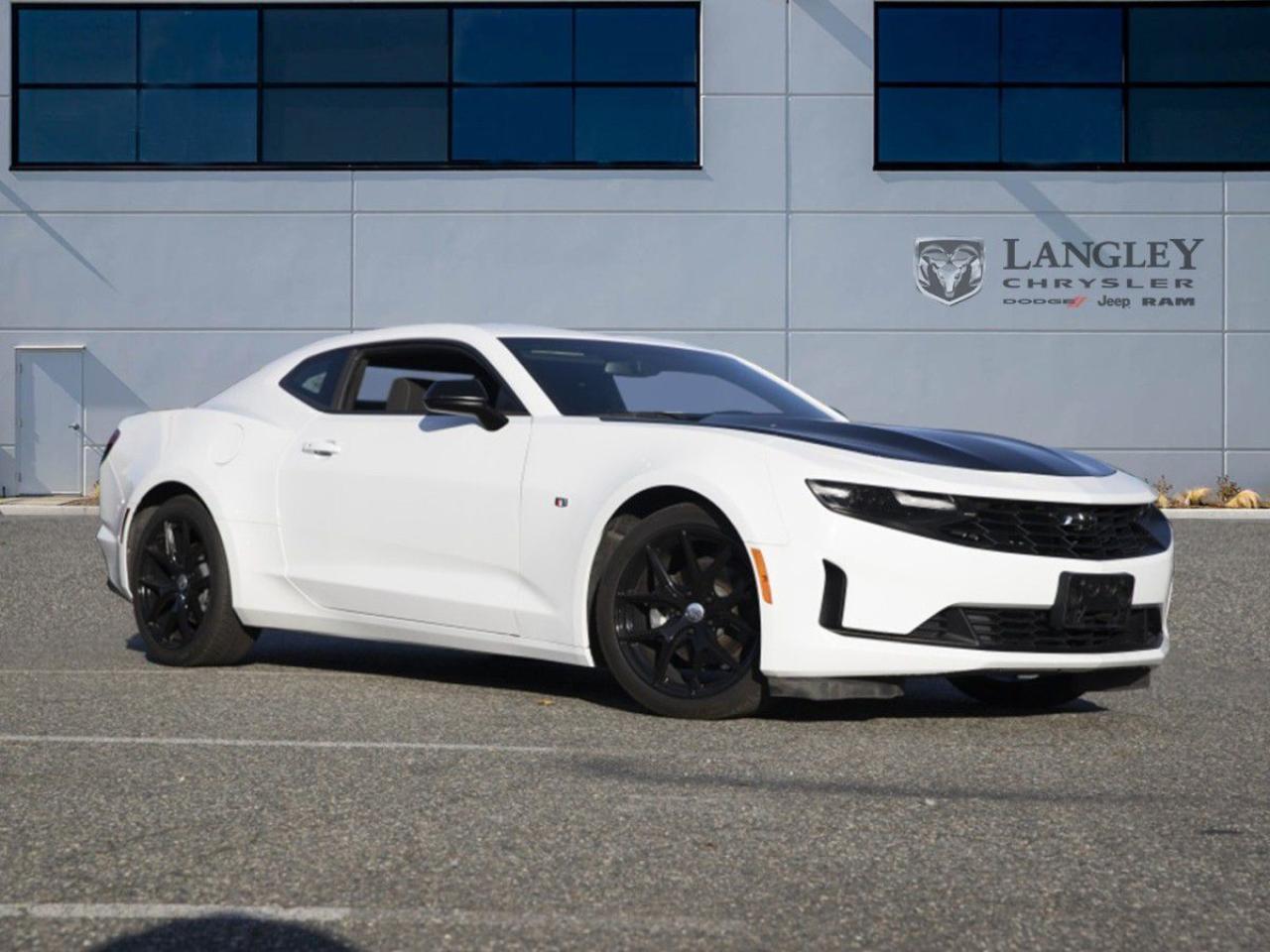 <p><strong><span style=font-family:Arial; font-size:18px;>Rev up your driving experience with this 2019 Chevrolet Camaro 1LS Coupe featuring Cloth Seats, Bluetooth, and a Back-up Camera.</span></strong></p> <p><span style=font-family:Arial; font-size:18px;></span></p> <ul><li><span style=font-family:Arial; font-size:18px;>Cloth Seats</span></li><li><span style=font-family:Arial; font-size:18px;>Bluetooth Connectivity</span></li><li><span style=font-family:Arial; font-size:18px;>Back-up Camera</span></li><li><span style=font-family:Arial; font-size:18px;>6 Speed Manual Transmission</span></li><li><span style=font-family:Arial; font-size:18px;>2.0L 4-cylinder Engine</span></li><li><span style=font-family:Arial; font-size:18px;>Traction Control</span></li><li><span style=font-family:Arial; font-size:18px;>Air Conditioning</span></li><li><span style=font-family:Arial; font-size:18px;>Power Windows & Steering</span></li><li><span style=font-family:Arial; font-size:18px;>Automatic Temperature Control</span></li><li><span style=font-family:Arial; font-size:18px;>Security System</span></li><li><span style=font-family:Arial; font-size:18px;>Fully Automatic Headlights</span></li></ul> <p><span style=font-family:Arial; font-size:18px;></span></p> <p><span style=font-family:Arial; font-size:18px;>This pre-owned beauty, with just 22,787 km on the odometer, offers the perfect blend of style and performance. Its striking white exterior paired with a sleek black interior ensures youll turn heads wherever you go. And lets not forget, with a 6-speed manual transmission, youll feel truly connected to the road.</span></p> <p><span style=font-family:Arial; font-size:18px;>Ever hear about the car that could talk? It couldnt keep its mouth shut about this Camaros Bluetooth and back-up camera! Seriously, though, this vehicle is all about enhancing your driving pleasure without breaking the bank.</span></p> <p><span style=font-family:Arial; font-size:18px;>Dont just love your car, love buying it! Visit Langley Chrysler today and make this Camaro yours. Engage with the road and experience the thrill only a Camaro can deliver</span></p>Dealer number: 5097, Doc fee: $968 Safety & Convince Warranty: $699 Finance Placement: $628

<p>*All prices plus applicable taxes, applicable environmental recovery charges, documentation of $599 and full tank of fuel surcharge of $76 if a full tank is chosen. <br />Other protection items available that are not included in the above price:<br />Tire & Rim Protection and Key fob insurance starting from $599<br />Service contracts (extended warranties) for coverage up to 7 years and 200,000 kms starting from $599<br />Custom vehicle accessory packages, mudflaps and deflectors, tire and rim packages, lift kits, exhaust kits and tonneau covers, canopies and much more that can be added to your payment at time of purchase<br />Undercoating, rust modules, and full protection packages starting from $199<br />Financing Fee of $500 when applicable<br />Flexible life, disability and critical illness insurances to protect portions of or the entire length of vehicle loan</p>