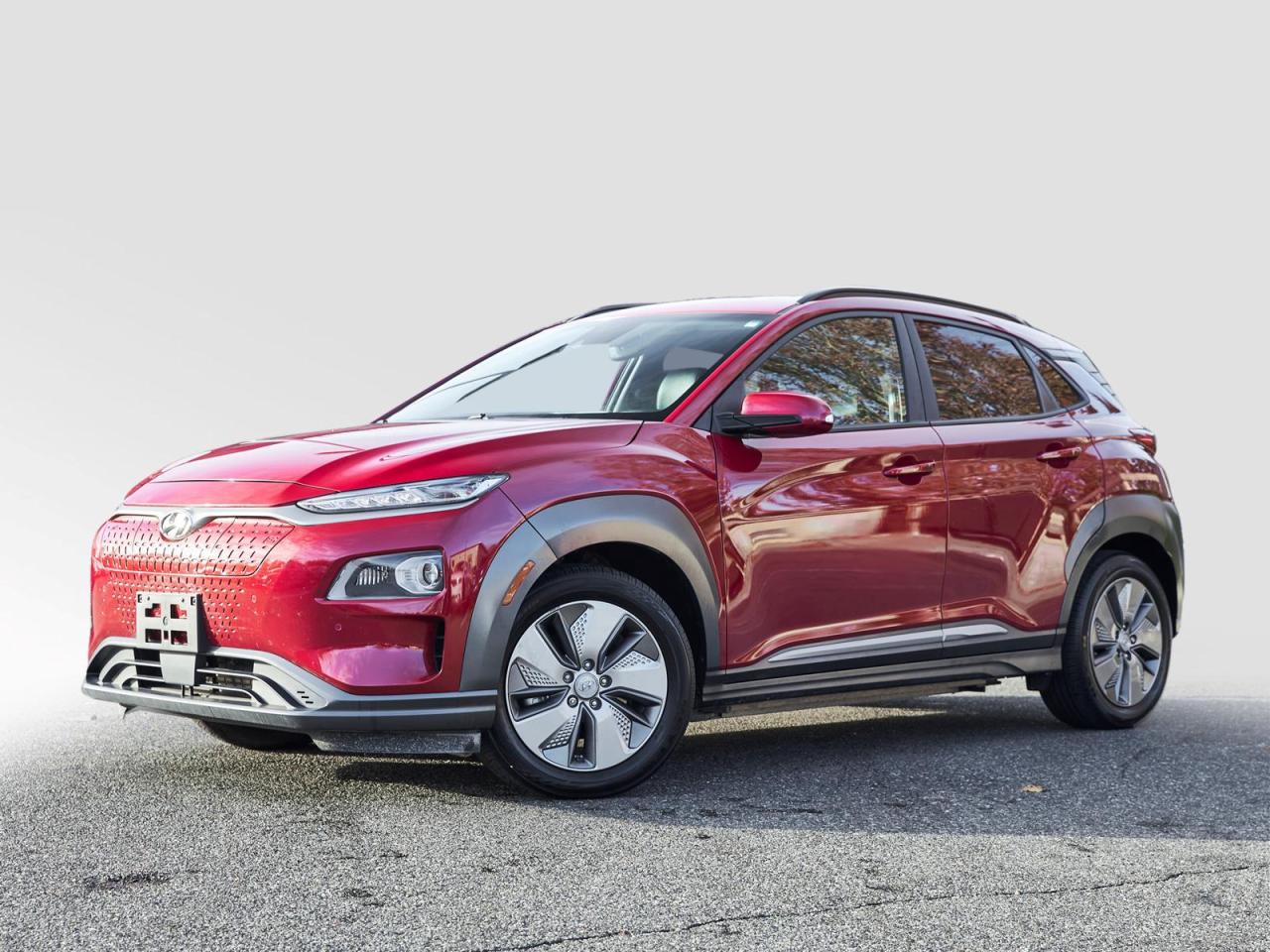 ULTIMATE | APPLE CARPLAY | NO PST | CERTIFIED | HEATED SEATS | HEATED STEERING | REAR VIEW CAMERA | VENTILATED SEATS | REAR VIEW CAMERA | BLIND SPOT DETECTION<br /><br />Recent Arrival! 2021 Hyundai Kona Electric Ultimate Pulse Red Electric Motor 1-Speed Automatic FWD<br /><br /><br />Why Buy From us?<br />*7x Hyundai President's Award of Merit Winner<br />*3x Consumer Choice Award for Business Excellence<br />*AutoTrader Dealer of the Year<br /><br />M-Promise Certified Preowned ($995 value):<br />- 30-day/2,000 Km Exchange Program<br />- 3-day/300 Km Money Back Guarantee<br />- Comprehensive 144 Point Mechanical Inspection<br />- Full Synthetic Oil Change<br />- BC Verified CarFax<br />- Minimum 6 Month Power Train Warranty<br /><br />Our vehicles are priced under market value to give our customers a hassle free experience. We factor in mechanical condition, kilometres, physical condition, and how quickly a particular car is selling in our market place to make sure our customers get a great deal up front and an outstanding car buying experience overall. Dealer #31129.<br /><br /><br />Odometer is 4093 kilometers below market average!<br /><br />Awards:<br />* ALG Canada Residual Value Awards<br /><br />CALL NOW!! This vehicle will not make it to the weekend!!