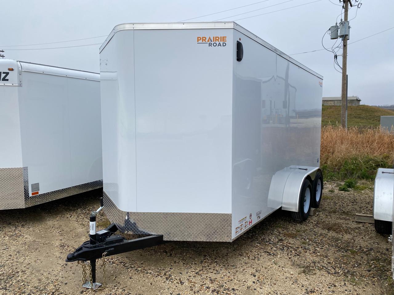 <p><span style=font-size: 13.5pt; line-height: 107%; font-family: Segoe UI, sans-serif; background: white;>Prairie Road Cargo Trailers are built with quality and designed to help get your cargo or equipment from point A to point B in an environment protected from dust and weather.<br />7 X 14 V-nose, rear ramp door, white in colour, 2 5/16th ball coupler, 84 interior height, LED wall light, 32 side door with bar lock, 1 3.5 wall vent. </span><span style=font-size: 13.5pt; line-height: 107%; font-family: Segoe UI,sans-serif; mso-fareast-font-family: Calibri; mso-fareast-theme-font: minor-latin; mso-ansi-language: EN-US; mso-fareast-language: EN-US; mso-bidi-language: AR-SA;>Stock# HH5271. For more info call Wilfs Elie Ford toll free 877-360-3673. Dealer# 0521.</span></p>