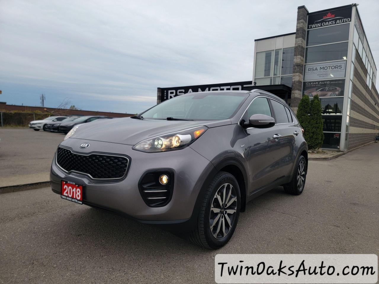 <p>Looking for a stylish and practical SUV thats ready for anything? Look no further than this 2018 Kia Sportage EX AWD, available now at Twin Oaks Auto! This sleek grey Sportage boasts a luxurious black interior and a powerful 4-cylinder engine, perfect for navigating city streets and weekend adventures alike. With 120,500km on the odometer, this Sportage is still in its prime, ready to provide years of reliable transportation.</p><p>Experience the comfort and convenience of this well-equipped Sportage, featuring a host of desirable amenities. Enjoy heated seats and steering wheel for cozy winter commutes, and stay connected on the go with Bluetooth connectivity and a premium sound system. Stay safe and secure with advanced features like a rearview camera, anti-lock brakes, and a comprehensive security system.</p><p>This 2018 Kia Sportage EX AWD is a perfect blend of style, performance, and practicality. Come visit Twin Oaks Auto today and experience the difference for yourself.</p><p>THE FULL CERTIFICATION COST OF THIS VEHICLE IS AN <strong>ADDITIONAL $690+HST</strong>. THE VEHICLE WILL COME WITH A FULL VALID SAFETY AND 36 DAY SAFETY ITEM WARRANTY. THE OIL WILL BE CHANGED, ALL FLUIDS TOPPED UP AND FRESHLY DETAILED. WE AT TWIN OAKS AUTO STRIVE TO PROVIDE YOU A HASSLE FREE CAR BUYING EXPERIENCE! WELL HAVE YOU DOWN THE ROAD QUICKLY!!! </p><p><strong>Financing Options Available!</strong></p><p><strong>TO CALL US 905-339-3330 </strong></p><p>We are located @ 2470 ROYAL WINDSOR DRIVE (BETWEEN FORD DR AND WINSTON CHURCHILL) OAKVILLE, ONTARIO L6J 7Y2</p><p>PLEASE SEE OUR MAIN WEBSITE FOR MORE PICTURES AND CARFAX REPORTS</p><p><span style=font-size: 18pt;>TwinOaksAuto.Com</span></p><p><em> </em></p>