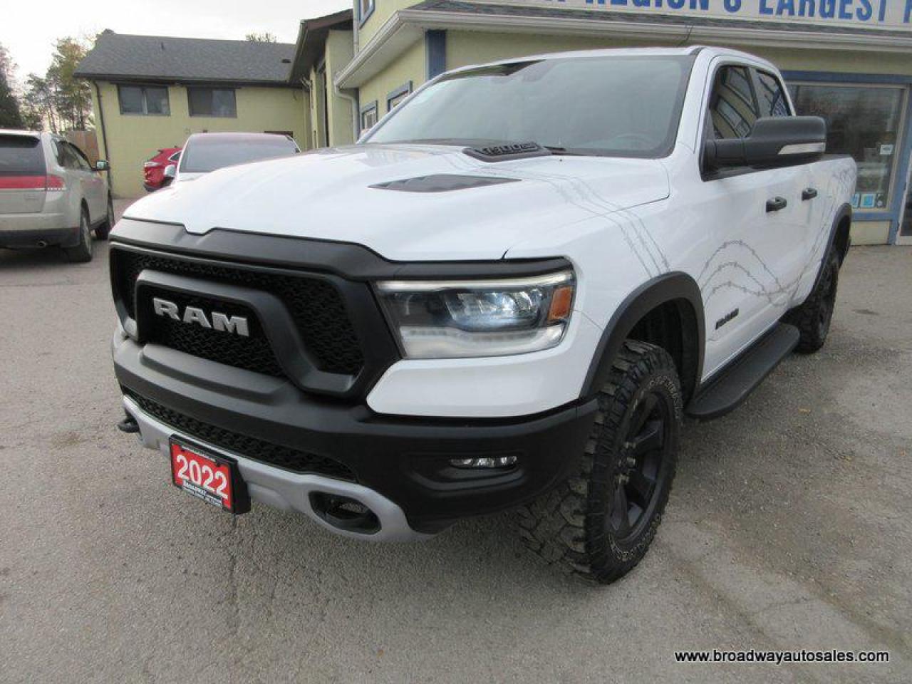 5.7L - V8 - HEMI - OHV 16 VALVE ENGINE    <br />4X4 SYSTEM    <br />QUAD-CAB    <br />6.6-FOOT-BOX     <br />RUNNING BOARDS    <br />TRACTION CONTROL   <br />TOW SUPPORT   <br />TRAILER BRAKE       <br />LEATHER INTERIOR   <br />HEATED FRONT SEATS     <br />HEATED STEERING WHEEL     <br />TOUCH SCREEN DISPLAY     <br />NAVIGATION SYSTEM      <br />AM/FM RADIO PLAYER   <br />AUX INPUT    <br />USB CONNECTION    <br />BLUETOOTH SYSTEM    <br />REVERSE PARKING AID    <br />BACK-UP CAMERA     <br />POWER REAR WINDOW        <br />POWER FOLDING SIDE MIRRORS     <br />POWER ADJUSTABLE PEDALS      <br />FOG LIGHTS     <br />KEYLESS ENTRY    <br />PUSH-BUTTON-IGNITION     <br />MULTI-FUNCTIONAL STEERING WHEEL <br /><br /><br /><br />Family owned and operated since 1975; Broadway Auto Sales is committed to making your next vehicle buying experience as seamless and straight forward as possible. With friendly, no pressure sales staff, as well as a huge selection of vehicles, it's very easy to see why Broadway Auto Sales is the perfect place to find your next ride. <br /><br />Our vehicles are sold and priced as CERTIFIED. Yes. that's right! No hidden mechanical or additional inspection fees are charged to the buyer. The price you see advertised, is the price you pay, plus any applicable HST and license costs. Our vehicles are certified on site, within our own service centre, by licensed, fully trained, and professional mechanics.<br /><br />Get a FREE Carfax Canada Report with the purchase of your new vehicle!<br /><br />Regardless of credit history, we have financing options for every situation. Our specialists work closely with each customer to understand a payment and vehicle that is right for them. We have been working with credit specialists to rebuild credit scores since 1975, and we can achieve approvals other dealers simply can't.<br /><br />Extended warranties on vehicles are also available; at an additional cost. We work with a variety of different warranty companies, and can help you choose based on your driving habits and budget.<br /><br />Have a trade-in? Let us know.. we pay top dollar for trades!<br /><br />Contact us today via e-mail, phone or in-person!<br /><br />WWW.BROADWAYAUTOSALES.COM