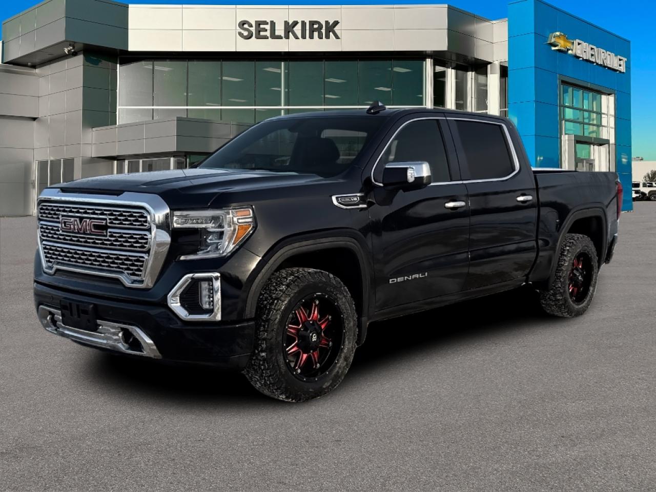 <b>Navigation,  Wireless Charging,  Leather Seats,  Cooled Seats,  Heated Seats!</b><br> <br>    With elegant style and refinement that beautifully match its brute capability, this professional grade GMC Sierra 1500 is ready to rule any road you take it on. This  2020 GMC Sierra 1500 is for sale today in Selkirk. <br> <br>This GMC Sierra 1500 stands out against all other pickup trucks, with sharper, more powerful proportions that creates a commanding stance on and off the road. Next level comfort and technology is paired with its outstanding performance and capability. Inside, the Sierra 1500 supports you through rough terrain with expertly designed seats and a pro grade suspension. Youll find an athletic and purposeful interior, designed for your active lifestyle. Get ready to live like a pro in this amazing GMC Sierra 1500! This  crew cab 4X4 pickup  has 133,122 kms. Its  onyx black in colour  . It has a 10 speed automatic transmission and is powered by a  355HP 5.3L 8 Cylinder Engine.  It may have some remaining factory warranty, please check with dealer for details. <br> <br> Our Sierra 1500s trim level is Denali. Stepping up to this Sierra 1500 Denali is a great choice as it comes fully loaded with leather heated and cooled seats, exclusive aluminum wheels, chrome running boards, a remote engine start, LED cargo box lighting with a spray in bed liner, an 8 inch touchscreen display paired with navigation, Apple CarPlay and Android Auto, a Bose premium sound system and it is 4G LTE capable. Additional features include a heated leather wrapped steering wheel, power-adjustable heated side mirrors, front and rear park assist, a MultiPro tailgate, HD rear vision camera, lane change alert with blind spot detection, signature LED lighting, 10-way power seats, a CornerStep rear bumper and a GMC ProGrade trailering system for added convenience. This vehicle has been upgraded with the following features: Navigation,  Wireless Charging,  Leather Seats,  Cooled Seats,  Heated Seats,  Premium Audio,  Remote Start. <br> <br>To apply right now for financing use this link : <a href=https://www.selkirkchevrolet.com/pre-qualify-for-financing/ target=_blank>https://www.selkirkchevrolet.com/pre-qualify-for-financing/</a><br><br> <br/><br>Selkirk Chevrolet Buick GMC Ltd carries an impressive selection of new and pre-owned cars, crossovers and SUVs. No matter what vehicle you might have in mind, weve got the perfect fit for you. If youre looking to lease your next vehicle or finance it, we have competitive specials for you. We also have an extensive collection of quality pre-owned and certified vehicles at affordable prices. Winnipeg GMC, Chevrolet and Buick shoppers can visit us in Selkirk for all their automotive needs today! We are located at 1010 MANITOBA AVE SELKIRK, MB R1A 3T7 or via phone at 204-482-1010.<br> Come by and check out our fleet of 50+ used cars and trucks and 210+ new cars and trucks for sale in Selkirk.  o~o