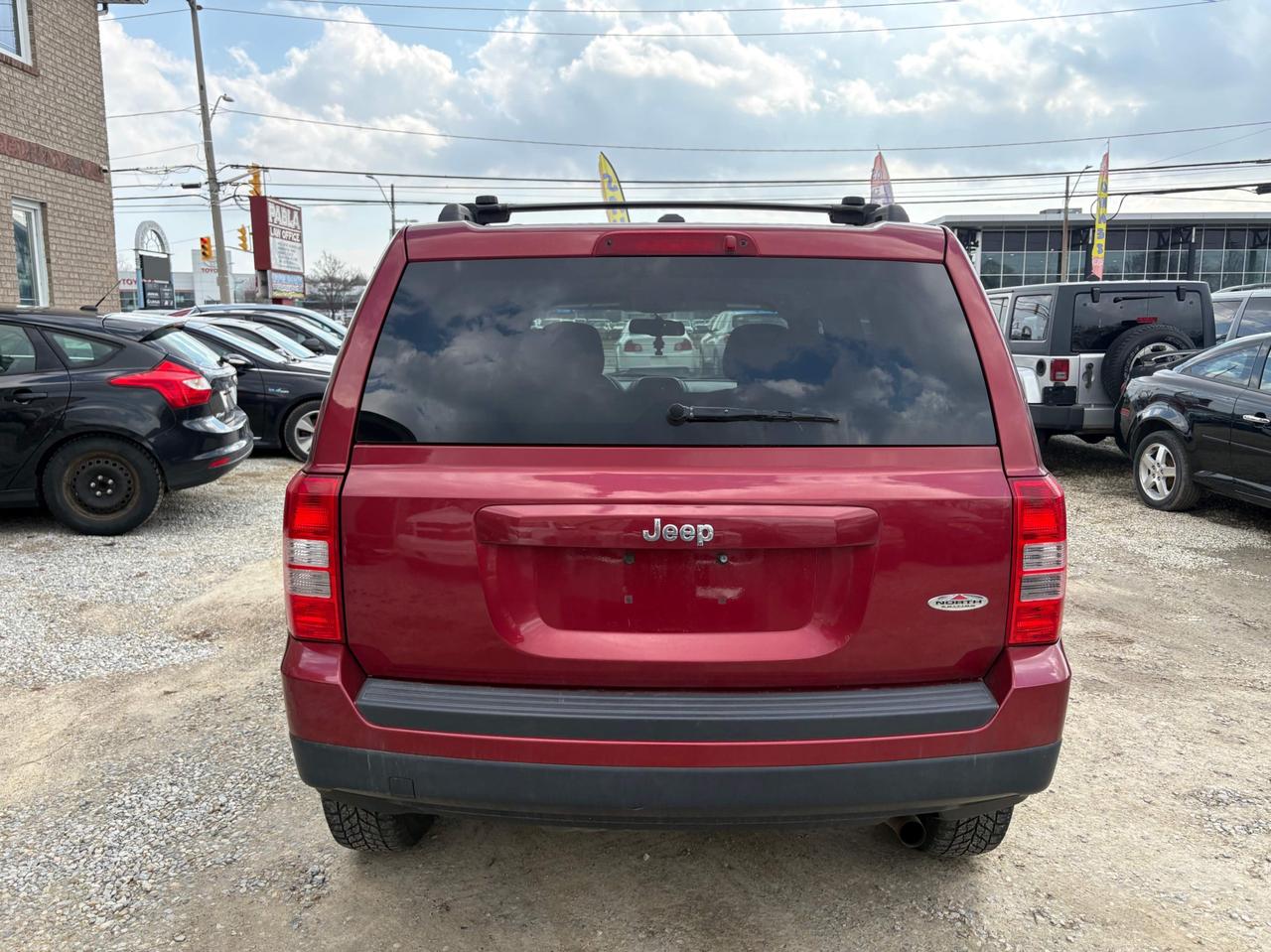 2014 Jeep Patriot FWD 4dr North with Safety and Warranty, Financing available Photo