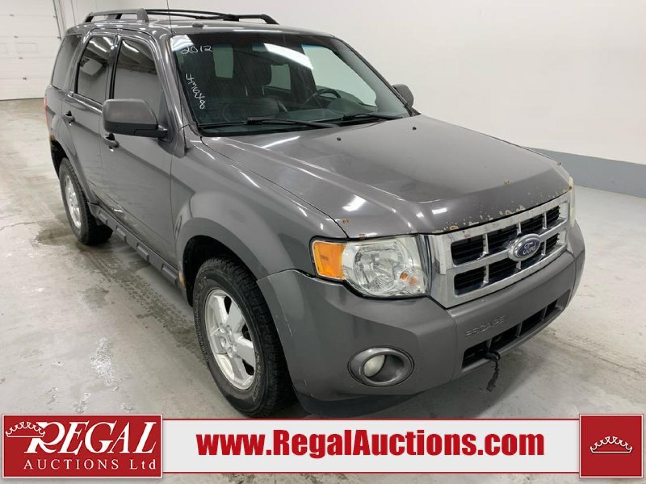 OFFERS WILL NOT BE ACCEPTED BY EMAIL OR PHONE - THIS VEHICLE WILL GO ON TIMED ONLINE AUCTION on Tuesday November 26.<br><br/>VEHICLE DESCRIPTION <br/>Stock #: 43648 <br/>Lot #: 598 <br/>Reserve Price: $2,450 <br/>CarProof Report: Not Available <br/><br/>IMPORTANT DECLARATION <br/>Claim History: Claim History. <br/>Hail Damage: Hail Damage. <br/>Rebuilt Status: This vehicle has been rebuilt from salvage. <br/> *HOOD REPLACED, WRONG EMISSION STICKER*  <br/> Live Online Bidding: This vehicle will be available for bidding over the internet, visit www.RegalAuctions.com to register. <br/> <br/>The simple solution to selling your car or truck. Bring your clean vehicle in with your Drivers License and current Registration and well put it on the auction block at our next sale.<br/><br/>www.RegalAuctions.com