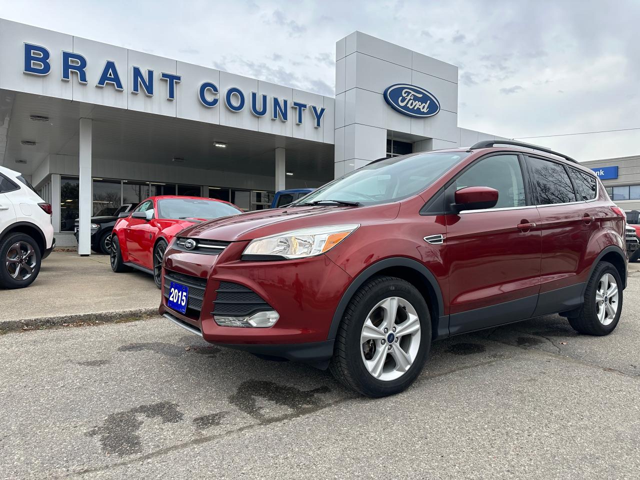 <p>ONLY 96032 KMS ! LEATHER HEATED SEATS, PANORAMIC ROOF, CLEAN CARFAX ! </p><p>Looking for a reliable and versatile SUV that wont break the bank? Look no further than this 2015 Ford Escape SE, available now at Brant County Ford. This stylish and capable crossover boasts a 4-cylinder engine and a smooth-shifting automatic transmission, making it perfect for both city commutes and weekend adventures. With its 4-wheel drive system, you can confidently handle any weather condition.</p><p>This Escape SE comes packed with features that enhance both comfort and safety. Enjoy the convenience of keyless entry, power windows, and power locks. Stay comfortable with features like automatic headlights, cruise control, and tilt steering wheel. Safety is paramount, and this Escape is equipped with anti-lock brakes, multiple airbags, and traction control for peace of mind.</p><p><strong>Here are 5 of the Escape SEs most enticing features:</strong></p><ul><li><strong>4-Wheel Drive:</strong> Take on any road condition with confidence.</li><li><strong>Sunroof/Moonroof:</strong> Enjoy open-air driving on sunny days.</li><li><strong>Keyless Entry:</strong> Convenience at your fingertips.</li><li><strong>Automatic Headlights:</strong> Added safety and peace of mind.</li><li><strong>Power Windows:</strong> Effortless comfort for every passenger.</li></ul><p>Visit Brant County Ford today to test drive this well-maintained and feature-packed 2015 Ford Escape SE.</p><p class=MsoNoSpacing>SERVICE/RECON – Full Safety Inspection completed, oil and filter change completed -<span style=mso-spacerun: yes;>  </span>Please contact us for more details.</p><p class=MsoNoSpacing>Price includes safety.<span style=mso-spacerun: yes;>  </span>We are a full disclosure dealership - ask to see this vehicles CarFax report.</p><p class=MsoNoSpacing><span style=mso-spacerun: yes;> </span>Brant County Ford is a family-owned dealership and has been a proud member of the Brantford community for over 40 years!</p><p class=MsoNoSpacing>** See dealer for details.</p><p class=MsoNoSpacing>*Please note all prices are plus HST and Licensing.</p><p class=MsoNoSpacing>* Prices in Ontario, Alberta and British Columbia include OMVIC/AMVIC fee (where applicable), accessories, other dealer installed options, administration and other retailer charges.</p><p class=MsoNoSpacing> </p><p class=MsoNoSpacing>All prices are in Canadian dollars (unless otherwise indicated). Retailers are free to set individual prices.</p>