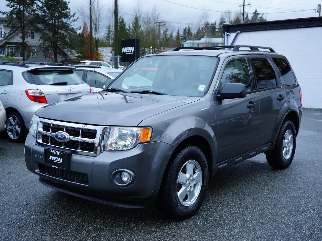 <p>Looking for a reliable and versatile SUV that wont break the bank? Look no further than this 2010 Ford Escape, available now at H2H Auto Group. This stylish and practical SUV boasts a spacious interior, perfect for families or adventurers alike. With its 4-cylinder engine and front-wheel drive, the Escape offers a smooth and efficient ride, making it ideal for navigating city streets or hitting the open road.</p><p>This Escape comes loaded with features to enhance your driving experience, including keyless entry, heated mirrors, power windows, power locks, and cruise control. Enjoy the convenience of a tilt steering wheel, power drivers seat, and a rear bench seat for extra passenger comfort. The Escape also features safety features like anti-lock brakes, multiple airbags, and traction control, providing peace of mind on every journey.</p><p>This pre-owned Escape has 164,109km on the odometer and is ready for its next adventure. Dont miss out on this fantastic opportunity to own a reliable and well-equipped SUV!</p><p><strong>Here are five features that will make you say Wow!:</strong></p><ol><li><strong>Power Driver Seat:</strong> Adjust your seat to your perfect position for maximum comfort and control.</li><li><strong>Heated Mirrors:</strong> Enjoy clear visibility even on cold mornings with the convenience of heated mirrors.</li><li><strong>Keyless Entry:</strong> Unlock your Escape with ease and never fumble for your keys again.</li><li><strong>Satellite Radio:</strong> Expand your listening options with access to a wide variety of channels.</li><li><strong>Power Windows:</strong> Enjoy the convenience of one-touch power windows for effortless temperature control.</li></ol><p><em>Powered by AutoIntelligence™ AI</em></p>