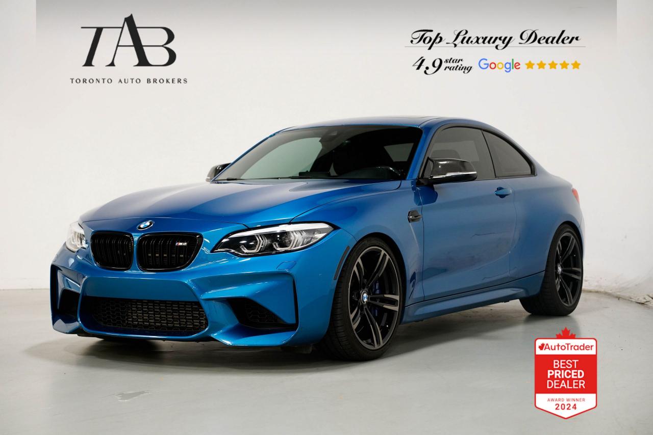 This 2018 BMW M2 Coupe is a Canadian Vehicle. It is a compact, high-performance sports car that offers thrilling driving dynamics, premium audio, and stylish carbon fiber accents. With a sporty design and agile handling, its built for enthusiasts who value power and precision.

Key Features:

3.0L turbocharged inline-6 engine (365 hp, 343 lb-ft torque)
7-speed dual-clutch automatic 
Rear-wheel drive
Harman Kardon premium audio system
Carbon fiber interior and exterior accents
19-inch forged alloy wheels
Adaptive M suspension
M Sport brakes
Leather upholstery with M2 badging
iDrive infotainment system with 8.8-inch touchscreen
Navigation system
Dual-zone automatic climate control
Heated front sport seats
Rearview camera with parking sensors

NOW OFFERING 3 MONTH DEFERRED FINANCING PAYMENTS ON APPROVED CREDIT

WE OFFER THE BEST FINANCE RATES, AND DONT CHARGE ANY FINANCING FEE.

Looking for a top-rated pre-owned luxury car dealership in the GTA? Look no further than Toronto Auto Brokers (TAB)! Were proud to have won multiple awards, including the 2024 AutoTrader Best Priced Dealer, 2024 CBRB Dealer Award, the Canadian Choice Award 2024, the 2024 BNS Award, the 2024 Three Best Rated Dealer Award, and many more!

With 30 years of experience serving the Greater Toronto Area, TAB is a respected and trusted name in the pre-owned luxury car industry. Our 30,000 sq.Ft indoor showroom is home to a wide range of luxury vehicles from top brands like BMW, Mercedes-Benz, Audi, Porsche, Land Rover, Jaguar, Aston Martin, Bentley, Maserati, and more. And we dont just serve the GTA, were proud to offer our services to all cities in Canada, including Vancouver, Montreal, Calgary, Edmonton, Winnipeg, Saskatchewan, Halifax, and more.

At TAB, were committed to providing a no-pressure environment and honest work ethics. As a family-owned and operated business, we treat every customer like family and ensure that every interaction is a positive one. Come experience the TAB Lifestyle at its truest form, luxury car buying has never been more enjoyable and exciting!

We offer a variety of services to make your purchase experience as easy and stress-free as possible. From competitive and simple financing and leasing options to extended warranties, aftermarket services, and full history reports on every vehicle, we have everything you need to make an informed decision. We welcome every trade, even if youre just looking to sell your car without buying, and when it comes to financing or leasing, we offer same day approvals, with access to over 50 lenders, including all of the banks in Canada. Feel free to check out your own Equifax credit score without affecting your credit score, simply click on the Equifax tab above and see if you qualify.

So if youre looking for a luxury pre-owned car dealership in Toronto, look no further than TAB! We proudly serve the GTA, including Toronto, Etobicoke, Woodbridge, North York, York Region, Vaughan, Thornhill, Richmond Hill, Mississauga, Scarborough, Markham, Oshawa, Peteborough, Hamilton, Newmarket, Orangeville, Aurora, Brantford, Barrie, Kitchener, Niagara Falls, Oakville, Cambridge, Kitchener, Waterloo, Guelph, London, Windsor, Orillia, Pickering, Ajax, Whitby, Durham, Cobourg, Belleville, Kingston, Ottawa, Montreal, Vancouver, Winnipeg, Calgary, Edmonton, Regina, Halifax, and more.

Call us today or visit our website to learn more about our inventory and services. And remember, all prices exclude applicable taxes and licensing, and vehicles can be certified at an additional cost of $799.