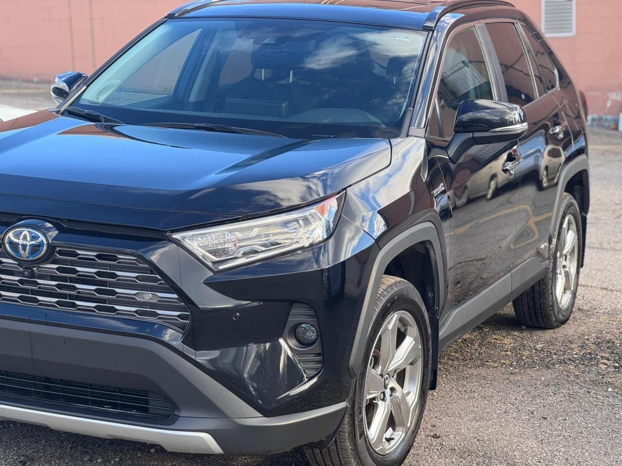 <p style=box-sizing: border-box; padding: 0px; margin: 0px 0px 1.375rem;><span style=box-sizing: border-box; font-size: 14pt;><strong style=box-sizing: border-box;>2020 TOYOTA RAV4 HYBRID LIMITED AWD</strong></span>, HEATED SEATS, BLIND SPOT ALERT, KEYLESS ENTRY, LANE KEEP ASSIST, APPLE CAR PLAY, ANDRIOD AUTO, COLLISION DETECTION SYSTEM, ADAPTIVE CRUISE CONTROL, CLEAN CARFAX AND MUCH MORE</p><p style=box-sizing: border-box; padding: 0px; margin: 0px 0px 10px; font-family: Open Sans, sans-serif; font-size: 13px; background-color: #ffffff;><span style=box-sizing: border-box; font-size: 14pt;><strong style=box-sizing: border-box;>HST and Licensing will be extra**</strong></span></p><p style=box-sizing: border-box; padding: 0px; margin: 0px 0px 10px; font-family: Open Sans, sans-serif; font-size: 13px; background-color: #ffffff;><span style=box-sizing: border-box; font-size: 14pt;><strong style=box-sizing: border-box;>Certification is available for $799 -     </strong></span><span style=box-sizing: border-box; color: #3a3a3a; font-size: 15px;>CERTIFICATION* As per OMVIC regulations: Vehicle is not drivable, not certified and not e-tested. Not only do we abide by the ministry of transportation standards when certifying our vehicles, we go above and beyond to ensure the highest quality product. We ensure double the ministry standards on brake rotors and pads as well as all four tires. We also provide a 90-day guarantee on the battery on your vehicle with no questions asked...</span></p><p style=box-sizing: border-box; padding: 0px; margin: 0px 0px 10px; font-family: Open Sans, sans-serif; font-size: 13px; background-color: #ffffff;>FINANCING AVAILABLE AT AS LOW AS 6.98% O.A.C</p><p style=box-sizing: border-box; padding: 0px; margin: 0px 0px 10px; font-family: Open Sans, sans-serif; font-size: 13px; background-color: #ffffff;>WE WELCOME EVERYONE-GOOD/BAD CREDIT, NEWCOMERS, STUDENTS. EVERYONE IS APPROVED.</p><p style=box-sizing: border-box; padding: 0px; margin: 0px 0px 10px; font-family: Open Sans, sans-serif; font-size: 13px; background-color: #ffffff;>PREVIOUSLY DECLINED BY BANK ? NO PROBLEM </p><p style=box-sizing: border-box; padding: 0px; margin: 0px 0px 10px; font-family: Open Sans, sans-serif; font-size: 13px; background-color: #ffffff;>LET THE EXPERIENCED PROFESSIONALS HANDLE YOUR CREDIT APPLICATION. </p><p style=box-sizing: border-box; padding: 0px; margin: 0px 0px 10px; font-family: Open Sans, sans-serif; font-size: 13px; background-color: #ffffff;>APPLY FOR PRE-APPROVAL TODAY!!</p><p style=box-sizing: border-box; padding: 0px; margin: 0px 0px 10px; font-family: Open Sans, sans-serif; font-size: 13px; background-color: #ffffff;><span style=box-sizing: border-box; font-size: 14pt;><strong style=box-sizing: border-box;><strong style=box-sizing: border-box;>$</strong><strong style=box-sizing: border-box;>999 Financing fee conditions may apply.</strong></strong></span></p><h4 style=box-sizing: border-box; padding: 0px; margin: 10px 0px; line-height: 1.1; font-size: 1.8rem; color: #262425; font-family: Open Sans; background-color: #ffffff;><span style=box-sizing: border-box; font-family: times new roman, times, serif; font-size: 14pt;><strong style=box-sizing: border-box;><span style=box-sizing: border-box; color: #3a3a3a;>FINANCE PURCHASE PRICE: $39,990 + HST & LICENSING</span></strong></span><br style=box-sizing: border-box; color: #3a3a3a; font-family: Roboto, sans-serif; font-size: 15px; font-weight: 400; /><span style=box-sizing: border-box; color: #3a3a3a; font-family: times new roman, times, serif; font-size: 15px; font-weight: 400;><span style=box-sizing: border-box; font-size: 14pt;><strong style=box-sizing: border-box;>CASH PRICE: $42,999 + HST & LICENSING</strong></span></span></h4><h4 style=box-sizing: border-box; padding: 0px; margin: 10px 0px; line-height: 1.1; font-size: 1.8rem; font-family: Open Sans; color: #262425; background-color: #ffffff;>Warranty</h4><p style=box-sizing: border-box; padding: 0px; margin: 0px 0px 10px; font-family: Open Sans, sans-serif; font-size: 13px; background-color: #ffffff; outline: 0px;>36 DAY/1000 KMS WARRANTY ON SAFETY ITEMS.</p><p style=box-sizing: border-box; padding: 0px; margin: 0px 0px 10px; font-family: Open Sans, sans-serif; font-size: 13px; background-color: #ffffff; outline: 0px;>EXTENDED WARRANTY AND GAP INSURANCES ARE AVAILABLE ON REQUEST</p>