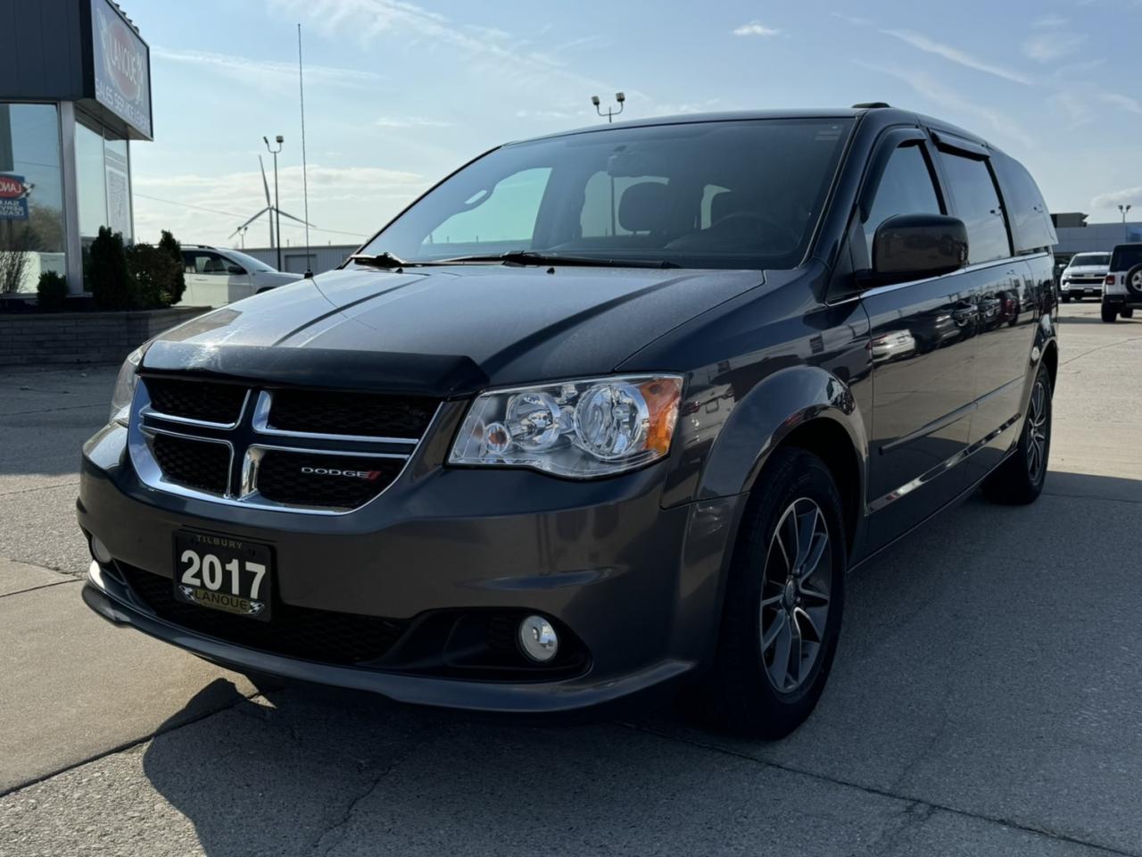 <p style=text-align: center;><span style=font-size: 18pt;><strong>2017 DODGE GRAND CARAVAN </strong></span><span style=font-size: 24px;><strong>4DR WGN SXT PREMIUM PLUS</strong></span></p><p style=text-align: center;><span style=font-size: 18pt;><strong>3.6L PENTASTAR VVT V6</strong></span></p><p style=text-align: center;><span style=font-size: 14pt;>283 HORSEPOWER | 260 LB-FT OF TORQUE</span></p><p style=text-align: center;><span style=font-size: 14pt;>9.4L/100KM HIGHWAY | 13.7L/100KM CITY | 11.8L/100KM COMBINED</span></p><p style=text-align: center;><span style=font-size: 18pt;><strong>6-SPEED AUTOMATIC TRANSMISISON</strong></span></p><p style=text-align: center;><span style=font-size: 18pt;><strong>17 ALUMINUM WHEELS W/ GRANITE CRYSTAL</strong></span></p><p style=text-align: center;> </p><p style=text-align: center;><span style=font-size: 14pt;><strong>FUNCTIONAL / SAFETY  FEATURES</strong></span></p><p style=text-align: center;><span style=font-size: 14pt;>Advanced multistage front air bags, Supplemental side−curtain air bags, Supplemental front seat side air bags, Supplemental driver’s knee blocker air bag, Electronic Stability Control, Trailer Sway Control, Tire pressure monitoring warning lamp, Cruise control, Tilt/telescoping steering column, Keyless entry with antitheft engine immobilizer, Fuel optimizer calibration, Power rack and pinion steering, Touring suspension, Front and rear 12−volt power outlets, 12−volt auxiliary power outlet, Rear window defroster, Tire inflator kit, Rear window wiper with washer, Engine block heater</span></p><p style=text-align: center;><span style=font-size: 14pt;><strong>INTERIOR FEATURES</strong></span></p><p style=text-align: center;><span style=font-size: 14pt;>Second−row bench seats with rear 60/40 Stow ’n Go, A/C w/ front dual−zone manual temperature control, Power windows with driver one−touch down, Power locks, Radio 130 AM/FM/CD, 4 speakers, Steering wheel−mounted audio controls, Outside temperature display, Overhead console, Liftgate flood lamp</span></p><p style=text-align: center;><span style=font-size: 14pt;><strong>EXTERIOR FEATURES</strong></span></p><p style=text-align: center;><span style=font-size: 14pt;>17−inch wheel covers, 17x6.5−inch steel wheels with covers, Tinted glass, Power, heated, manual folding mirrors, Quad−lens halogen headlamps, Daytime running lamps − park and turn</span></p><p style=text-align: center;> </p><p style=text-align: center;><span style=font-size: 14pt;><strong>OPTIONAL EQUIPMENT</strong></span></p><p style=text-align: center;><span style=font-size: 14pt;><em><span style=text-decoration: underline;>Granite Crystal Metallic Exterior</span></em></span></p><p style=text-align: center;><span style=font-size: 14pt;><em><span style=text-decoration: underline;>Customer Preferred Package 29P:</span></em></span><br /><span style=font-size: 14pt;>17x6.5−in alum w/Granite Crystal, Premium interior accents, Bright side roof rails, Leather front bucket w/ suede inserts, Fog lamps, Super console, 2nd− & 3rd−row Stow ’n Go seats, 2nd−row Stow ’n Go bucket seats, Second−row power windows, A/C w/ manual tri−zone temp control, Easy−clean floor mats, Integrated roof rail crossbars, Leather−wrapped shift knob, Leather−wrapped steering wheel, Power 2−way driver lumbar adjust, Power 8−way adjustable driver seat, 3rd−row power quarter−vented windows, Power windows w/ front 1−touch down, Rear air conditioning with heater, Sunscreen glass, Black finish instrument panel bezel, Highline door trim panel, Body−colour exterior mirrors, Bright belt mouldings, Body−colour bodyside moulding, Body−colour door handles, Body−colour sill applique</span></p><p style=text-align: center;><span style=font-size: 14pt;><em><span style=text-decoration: underline;>Uconnect Hands−Free Group:</span></em></span><br /><span style=font-size: 14pt;>Bluetooth streaming audio, Remote USB port, Auto−dimming rearview mirror w/ mic, SiriusXM satellite radio, Hands−free comm. with Bluetooth</span></p><p style=text-align: center;><span style=font-size: 14pt;><em><span style=text-decoration: underline;>Compact spare tire</span></em></span></p><p style=text-align: center;> </p><p style=text-align: center;> </p><p style=box-sizing: border-box; margin-bottom: 1rem; margin-top: 0px; color: #212529; font-family: -apple-system, BlinkMacSystemFont, Segoe UI, Roboto, Helvetica Neue, Arial, Noto Sans, Liberation Sans, sans-serif, Apple Color Emoji, Segoe UI Emoji, Segoe UI Symbol, Noto Color Emoji; font-size: 16px; background-color: #ffffff; text-align: center; line-height: 1;><span style=box-sizing: border-box; font-family: arial, helvetica, sans-serif;><span style=box-sizing: border-box; font-weight: bolder;><span style=box-sizing: border-box; font-size: 14pt;>Here at Lanoue/Amfar Sales, Service & Leasing in Tilbury, we take pride in providing the public with a wide variety of High-Quality Pre-owned Vehicles. We recondition and certify our vehicles to a level of excellence that exceeds the Status Quo. We treat our Customers like family and provide the highest level of service from Start to Finish. If you’d like a smooth & stress-free car shopping experience, give one of our Sales Associates a call at 1-844-682-3325 to help you find your next NEW-TO-YOU vehicle!</span></span></span></p><p style=box-sizing: border-box; margin-bottom: 1rem; margin-top: 0px; color: #212529; font-family: -apple-system, BlinkMacSystemFont, Segoe UI, Roboto, Helvetica Neue, Arial, Noto Sans, Liberation Sans, sans-serif, Apple Color Emoji, Segoe UI Emoji, Segoe UI Symbol, Noto Color Emoji; font-size: 16px; background-color: #ffffff; text-align: center; line-height: 1;><span style=box-sizing: border-box; font-family: arial, helvetica, sans-serif;><span style=box-sizing: border-box; font-weight: bolder;><span style=box-sizing: border-box; font-size: 14pt;>Although we try to take great care in being accurate with the information in this listing, from time to time, errors occur. The vehicle is priced as it is physically equipped. Minor variances will not effect pricing. Please verify the vehicle is As Expected when you visit. Thank You!</span></span></span></p>