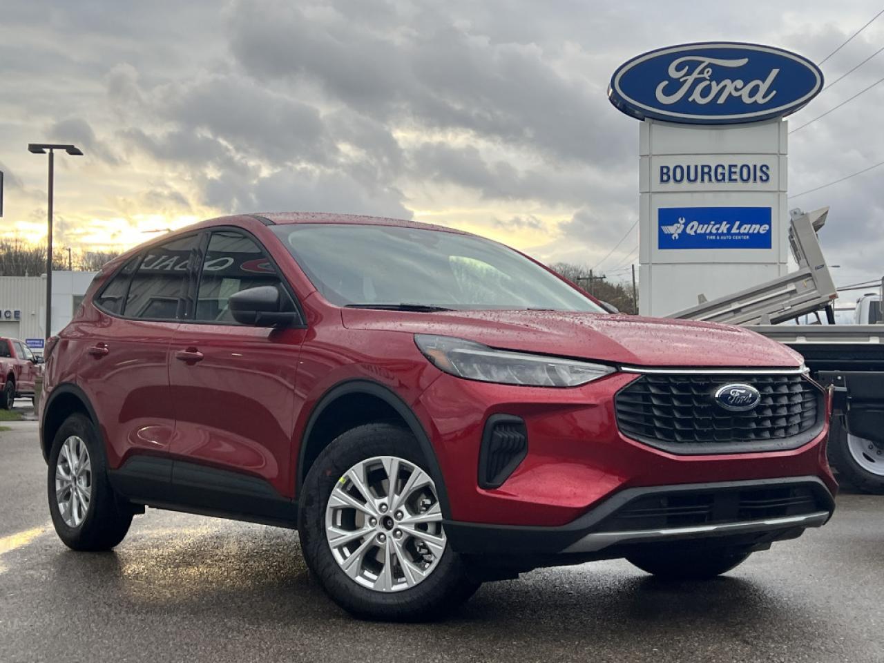 <b>Heated Seats, Power Liftgate, Wireless Charging, Cold Weather Package, Heated Steering Wheel!</b><br> <br> <br> <br>  Welcome. <br> <br><br> <br> This rapid red metallic tinted clearcoat SUV  has a 8 speed automatic transmission and is powered by a  180HP 1.5L 3 Cylinder Engine.<br> <br> Our Escapes trim level is Active. Immensely practical and stylish, this Ford Escape Active packs amazing standard features such as a power-operated liftgate for rear cargo access, LED headlights with automatic high beams, an 8-inch infotainment screen powered by SYNC 4 with wireless Apple CarPlay and Android Auto, FordPass Connect with 4G mobile internet hotspot access, and proximity keyless entry with push button start. Road safety features include blind spot detection, pre-collision assist with automatic emergency braking and a back-up camera, lane keeping assist, lane departure warning, and front and rear collision mitigation. Additional features include dual-zone climate control, front and rear cupholders, smart device remote engine start, and even more. This vehicle has been upgraded with the following features: Heated Seats, Power Liftgate, Wireless Charging, Cold Weather Package, Heated Steering Wheel, Remote Engine Start, Power Driver Seat. <br><br> View the original window sticker for this vehicle with this url <b><a href=http://www.windowsticker.forddirect.com/windowsticker.pdf?vin=1FMCU9GN1SUA12334 target=_blank>http://www.windowsticker.forddirect.com/windowsticker.pdf?vin=1FMCU9GN1SUA12334</a></b>.<br> <br>To apply right now for financing use this link : <a href=https://www.bourgeoismotors.com/credit-application/ target=_blank>https://www.bourgeoismotors.com/credit-application/</a><br><br> <br/> 5.99% financing for 84 months.  Incentives expire 2024-12-02.  See dealer for details. <br> <br>Discount on vehicle represents the Cash Purchase discount applicable and is inclusive of all non-stackable and stackable cash purchase discounts from Ford of Canada and Bourgeois Motors Ford and is offered in lieu of sub-vented lease or finance rates. To get details on current discounts applicable to this and other vehicles in our inventory for Lease and Finance customer, see a member of our team. </br></br>Discover a pressure-free buying experience at Bourgeois Motors Ford in Midland, Ontario, where integrity and family values drive our 78-year legacy. As a trusted, family-owned and operated dealership, we prioritize your comfort and satisfaction above all else. Our no pressure showroom is lead by a team who is passionate about understanding your needs and preferences. Located on the shores of Georgian Bay, our dealership offers more than just vehiclesits an experience rooted in community, trust and transparency. Trust us to provide personalized service, a diverse range of quality new Ford vehicles, and a seamless journey to finding your perfect car. Join our family at Bourgeois Motors Ford and let us redefine the way you shop for your next vehicle.<br> Come by and check out our fleet of 70+ used cars and trucks and 180+ new cars and trucks for sale in Midland.  o~o