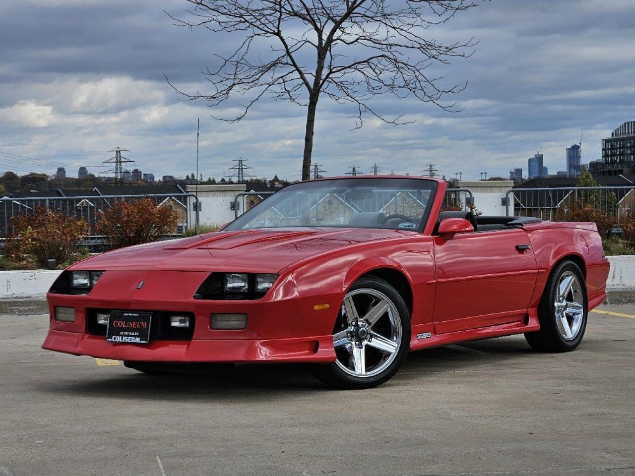 <p>Turn up the Heat with this 1991 Chevrolet Camaro Z28 Convertible!</p><p>Torch Red & Ready to Roll! Crank up the volume on your favorite Stevie B track, and enjoy open air cruising!</p><p>Step back into the groove with this iconic 1991 Camaro Z28, dressed to impress in sizzling Torch Red! This drop-top is pure fire from the ground up, with upgraded 17-inch IROC-style wheels that bring a touch of retro-cool style and grip the road like a dance floor in the 90s.</p><p>Flashback to Fast Times and Fresh Beats Imagine the bass pumpin, the sun shining, and youcruising top-down, free and easy. Its not just a ride; its a tribute to a time when Euro and freestyle music ruled the scene, and the open road was your ultimate playlist.</p><p>Own a piece of history thats as bold as the beats you grew up with. Get your hands on this 1991 Z28 Convertible and bring back the beat!</p><p>{ CERTIFIED PRE-OWNED }</p><p>**THIS VEHICLE COMES FULLY CERTIFIED WITH A SAFETY CERTIFICATE & SERVICED AT NO EXTRA COST**</p><p>TAKE ADVANTAGE OF OUR VOLUME BASED PRICING TO ENSURE YOU ARE GETTING **THE BEST DEAL IN TOWN**!!! THIS VEHICLE COMES FULLY CERTIFIED WITH A SAFETY CERTIFICATE AT NO EXTRA COST! FINANCING AVAILABLE & EXTENDED WARRANTIES AVAILABLE ON ALL VEHICLES!</p><p>COLISEUM AUTO SALES PROUDLY SERVING THE CUSTOMERS FOR OVER 25 YEARS! NOW WITH 2 LOCATIONS TO SERVE YOU BETTER. COME IN FOR A TEST DRIVE TODAY!<br>FOR ALL FAMILY LUXURY VEHICLES..SUVS..AND SEDANS PLEASE VISIT....</p><p>COLISEUM AUTO SALES ON WESTON<br>301 WESTON ROAD<br>TORONTO, ON M6N 3P1<br>4 1 6 - 7 6 6 - 2 2 7 7</p>