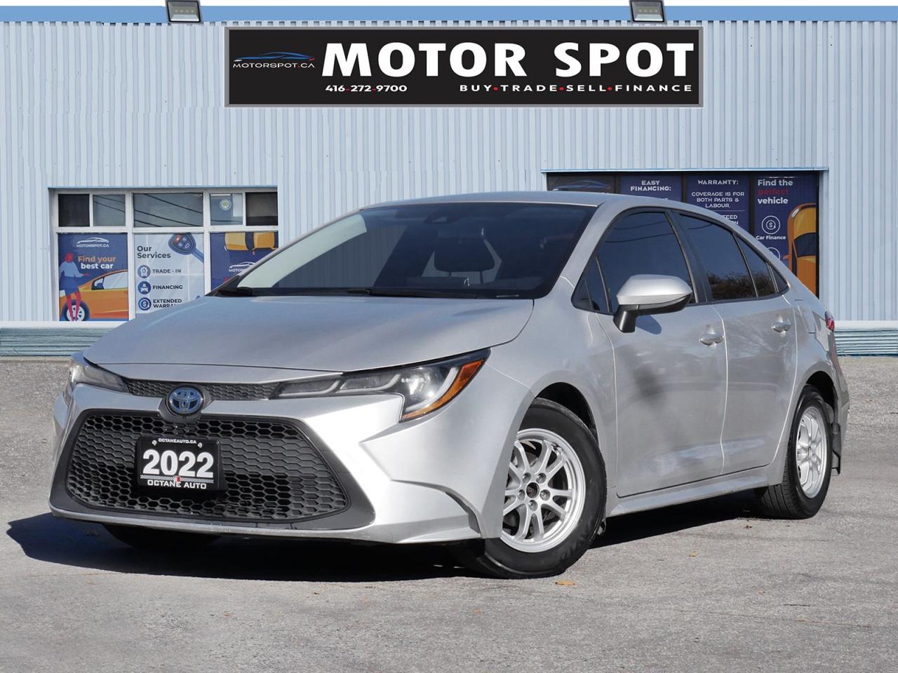 <div><font color=#242424><span>2022 Toyota Corolla Hybrid Accident-Free! One-Owner Vehicle! Ontario Vehicle! Equipped With Leather Seats! Push Button Start! Rear View Camera! Heated Seats! Heated Steering Wheels! Radar Cruise Control! Collision Assist! Lane Departure Assist! Wireless Phone Charging And Much More!</span></font><br></div><br /><div><span>**Certification:** Ensure your peace of mind with our comprehensive certification process. Each pre-owned vehicle undergoes a rigorous safety inspection, exceeding industry standards. Our service includes an oil change and professional detailing before delivery. Vehicles are not drivable, if not certified and not e-tested, a certification package is available for $699. We also welcome trade-ins, and taxes and licensing are additional.</span><br></div><div><font color=#242424 face=Segoe UI, Segoe UI Web (West European), Segoe UI, -apple-system, BlinkMacSystemFont, Roboto, Helvetica Neue, sans-serif><span><br /></span></font></div><div><font color=#242424 face=Segoe UI, Segoe UI Web (West European), Segoe UI, -apple-system, BlinkMacSystemFont, Roboto, Helvetica Neue, sans-serif><span>**Financing:** No matter your credit history, our finance and credit experts are here to help. Whether youre dealing with no credit, bankruptcy, consumer proposal, or collections, we specialize in securing approvals and starting your journey to rebuilding credit. Financing deals are subject to an Admin fee, and we offer on-the-spot financing with instant approvals.</span></font></div><div><font color=#242424 face=Segoe UI, Segoe UI Web (West European), Segoe UI, -apple-system, BlinkMacSystemFont, Roboto, Helvetica Neue, sans-serif><span><br /></span></font></div><div><font color=#242424 face=Segoe UI, Segoe UI Web (West European), Segoe UI, -apple-system, BlinkMacSystemFont, Roboto, Helvetica Neue, sans-serif><span>**Warranty:** Rest assured knowing your vehicle is eligible for an extended warranty. We offer various terms and coverages to suit your needs. Our team is ready to assist you in selecting the right warranty option.</span></font></div><div><font color=#242424 face=Segoe UI, Segoe UI Web (West European), Segoe UI, -apple-system, BlinkMacSystemFont, Roboto, Helvetica Neue, sans-serif><span><br /></span></font></div><div><font color=#242424 face=Segoe UI, Segoe UI Web (West European), Segoe UI, -apple-system, BlinkMacSystemFont, Roboto, Helvetica Neue, sans-serif><span>**Pricing:** At Motor Spot, we believe in fair and transparent pricing. Say goodbye to negotiationswe constantly monitor the market and adjust our prices below the market average to provide you with the best value. Enjoy a hassle-free buying experience with us and avoid paying more elsewhere.</span></font></div><div><font color=#242424 face=Segoe UI, Segoe UI Web (West European), Segoe UI, -apple-system, BlinkMacSystemFont, Roboto, Helvetica Neue, sans-serif><span><br /></span></font></div><div><font color=#242424 face=Segoe UI, Segoe UI Web (West European), Segoe UI, -apple-system, BlinkMacSystemFont, Roboto, Helvetica Neue, sans-serif><span>Visit us today or contact our team for more information. Your satisfaction is our priority at Motor Spot!</span></font></div>