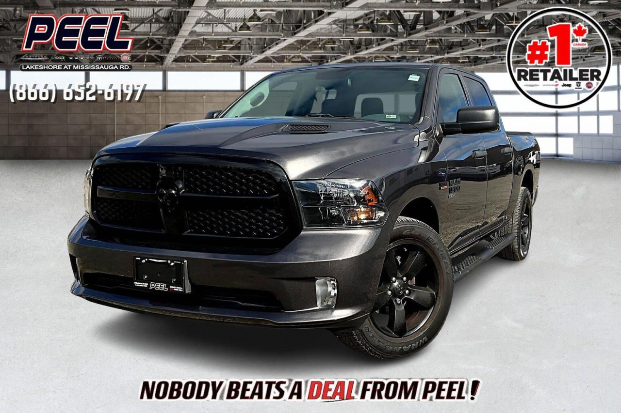 COME SEE WHY NOBODY BEATS A DEAL FROM PEEL! Your Source for ALL make and models used cars and trucks. Canadas #1 Stellantis Retailer for 8 years & counting!!

2019 Ram 1500 Classic Express Crew Cab 4X4 | 5.7L V8 | Granite Crystal Metallic | Night Edition | Premium Cloth Front 40/20/40 Bench Seat | Wheel & Sound Group | Sport Performance Hood | Hard Tri-fold Tonneau Cover | Mopar Black Side Steps | Spray-in Bed Liner | Husky All-weather Floor Mats

One Owner Clean Carfax

Stand out with power and style in this 2019 Ram 1500 Classic Express Crew Cab 4X4 finished in Granite Crystal Metallic and enhanced with the aggressive Night Edition package. Driven by a powerful 5.7L V8 engine, this truck combines performance with functionality. The Sport Performance Hood and Mopar black side steps add to its bold look, while the premium cloth front 40/20/40 bench seat provides comfort and flexibility inside. Equipped with the Wheel & Sound Group and Husky all-weather floor mats, the interior is practical and ready for any conditions. For added utility, this Ram includes a hard tri-fold tonneau cover and spray-in bed liner, making it ideal for work or weekend projects. With one owner and a clean Carfax, this Ram 1500 is a perfect balance of strength, style, and reliability.
______________________________________________________

Engage & Explore with Peel Chrysler: Whether youre inquiring about our latest offers or seeking guidance, 1-866-652-6197 connects you directly. Dive deeper online or connect with our team to navigate your automotive journey seamlessly.

WE TAKE ALL TRADES & CREDIT. WE SHIP ANYWHERE IN CANADA! OUR TEAM IS READY TO SERVE YOU 7 DAYS!
______________________________________________________

*FREE CarFax (click the link above to check it out at no cost to you!)*

*FULLY CERTIFIED! (Have you seen some of these other dealers stating in their advertisements that certification is an additional fee? NOT HERE! Our certification is already included in our low sale prices to save you more!)

______________________________________________________

Peel Chrysler  A Trusted Destination: Based in Port Credit, Ontario, we proudly serve customers from all corners of Ontario and Canada including Toronto, Oakville, North York, Richmond Hill, Ajax, Hamilton, Niagara Falls, Brampton, Thornhill, Scarborough, Vaughan, London, Windsor, Cambridge, Kitchener, Waterloo, Brantford, Sarnia, Pickering, Huntsville, Milton, Woodbridge, Maple, Aurora, Newmarket, Orangeville, Georgetown, Stouffville, Markham, North Bay, Sudbury, Barrie, Sault Ste. Marie, Parry Sound, Bracebridge, Gravenhurst, Oshawa, Ajax, Kingston, Innisfil and surrounding areas. On our website www.peelchrysler.com, you will find a vast selection of new vehicles including the new and used Ram 1500, 2500 and 3500. Chrysler Grand Caravan, Chrysler Pacifica, Jeep Cherokee, Wrangler and more. All vehicles are priced to sell. We deliver throughout Canada. website or call us 1-866-652-6197. 

Your Journey, Our Commitment: Beyond the transaction, Peel Chrysler prioritizes your satisfaction. While many of our pre-owned vehicles come equipped with two keys, variations might occur based on trade-ins. Regardless, our commitment to quality and service remains steadfast. Experience unmatched convenience with our nationwide delivery options. All advertised prices are for cash sale only. Optional Finance and Lease terms are available. A Loan Processing Fee of $499 may apply to facilitate selected Finance or Lease options. If opting to trade an encumbered vehicle towards a purchase and require Peel Chrysler to facilitate a lien payout on your behalf, a Lien Payout Fee of $299 may apply. Contact us for details. Peel Chrysler Pre-Owned Vehicles come standard with only one key.