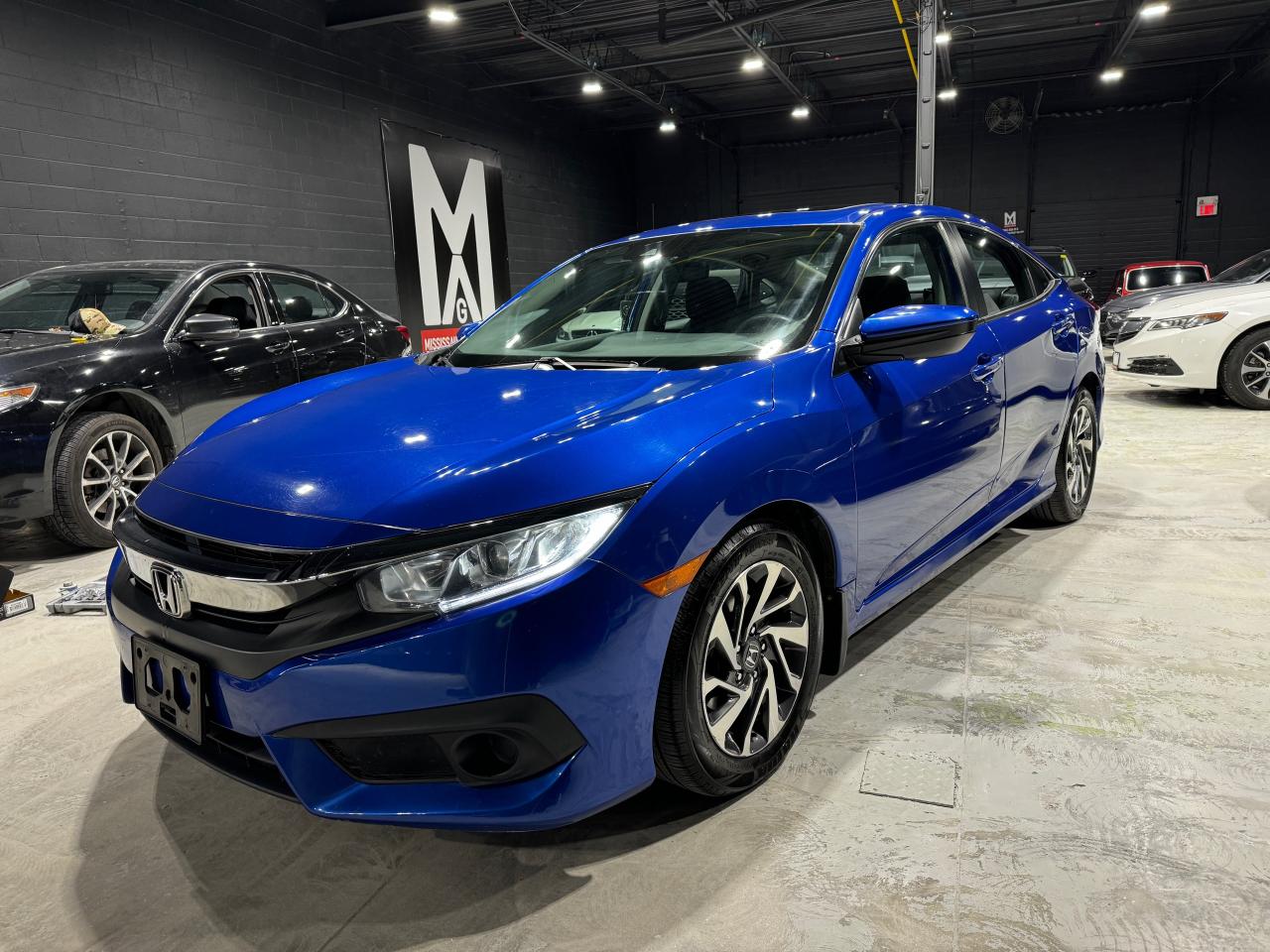 <p><strong>FOR SALE: 2018 Honda Civic EX – Excellent Condition!</strong></p><p><strong>Location:</strong> Mississauga Auto Group<br /><strong>Address:</strong> 2666 Royal Windsor Dr, Unit 11 & 12, Mississauga, Ontario<br /><strong>Contact:</strong> 905.808.1198</p><p><strong>Vehicle:</strong> 2018 Honda Civic EX<br /><strong>Condition:</strong> Great Condition, Certified<br /><strong>Trim:</strong> EX – Packed with Great Features</p><p><strong>Price:</strong> $18,950 + tax & licensing fees</p><p>FINANCING & WARRANTY AVAILABLE.</p><p>This 2018 Honda Civic EX offers reliability, efficiency, and comfort, making it a fantastic choice for anyone looking for a quality car. It’s certified, so you can drive away with confidence knowing it’s ready for the road!</p><p>Visit us or call for more details!</p><p><strong>Mississauga Auto Group</strong><br /><strong>2666 Royal Windsor Dr, Unit 11 & 12, Mississauga, Ontario</strong><br /><strong>905.808.1198</strong></p><p> </p><p>CARFAX LINK FOR HISTORY : <a class=in-cell-link style=font-family: Arial; font-size: 10pt; text-align: center; href=https://vhr.carfax.ca/?id=Ks089E3WKKtH18YWlCO6A6dzzl%2FuaX%2FL#accident-damage-section target=_blank rel=noopener>https://vhr.carfax.ca/?id=Ks089E3WKKtH18YWlCO6A6dzzl%2FuaX%2FL#accident-damage-section</a></p>