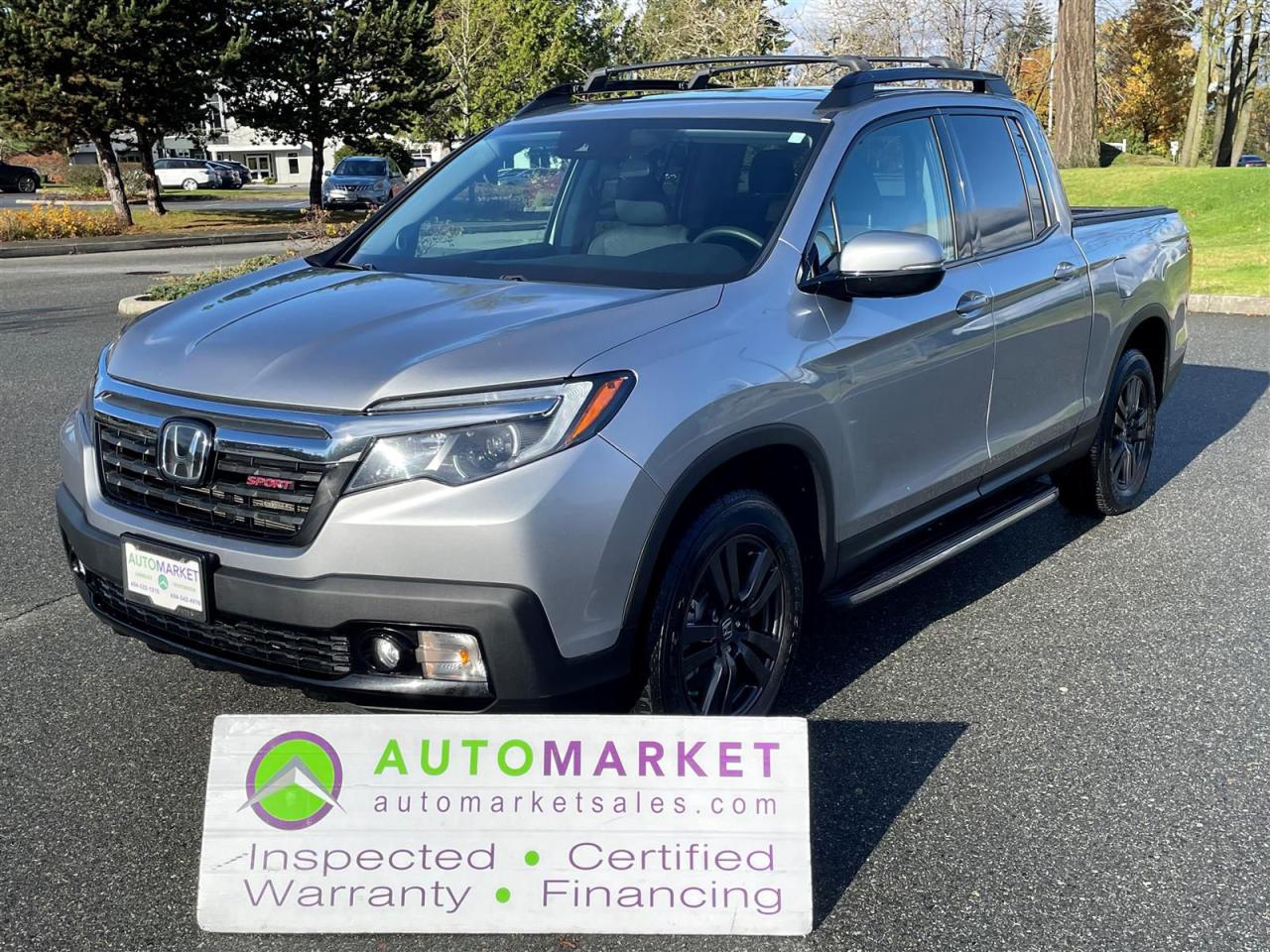 LOCAL ONE OWNER CREW SPORT WITH SUNROOF AND AWD. WE OFFER GREAT FINANCING, FREE WARRANTY AND IT'S INSPECTED W/BCAA MEMBERSHIP!<br /><br />Welcome to the Automarket, your community dealership of "YES". We are featuring a spectacular Ridgeline Sport which includes AWD, Carplay, Sunroof, Heated Seats, Bluetooth Telephone, Power Seats and sop much more.<br /><br />This Local One owner pick up truck has been fully inspected and has both excellent winter tires on rims as well as 4 All Seaon tires on rims with 75%% Tread life remaining and 95% Brake life remaining both on the front and the rear. The battery and the coolant has been tested and we changed the oil and fully detailed the vehicle for your enjoyment and peace of mind.<br /><br />2 LOCATIONS TO SERVE YOU, BE SURE TO CALL FIRST TO CONFIRM WHERE THE VEHICLE IS PARKED<br />WHITE ROCK 604-542-4970 LANGLEY 604-533-1310 OWNER'S CELL 604-649-0565<br /><br />We are a family owned and operated business since 1983 and we are committed to offering outstanding vehicles backed by exceptional customer service, now and in the future.<br />What ever your specific needs may be, we will custom tailor your purchase exactly how you want or need it to be. All you have to do is give us a call and we will happily walk you through all the steps with no stress and no pressure.<br />WE ARE THE HOUSE OF YES?<br />ADDITIONAL BENFITS WHEN BUYING FROM SK AUTOMARKET:<br />ON SITE FINANCING THROUGH OUR 17 AFFILIATED BANKS AND VEHICLE FINANCE COMPANIES<br />IN HOUSE LEASE TO OWN PROGRAM.<br />EVRY VEHICLE HAS UNDERGONE A 120 POINT COMPREHENSIVE INSPECTION<br />EVERY PURCHASE INCLUDES A FREE POWERTRAIN WARRANTY<br />EVERY VEHICLE INCLUDES A COMPLIMENTARY BCAA MEMBERSHIP FOR YOUR SECURITY<br />EVERY VEHICLE INCLUDES A CARFAX AND ICBC DAMAGE REPORT<br />EVERY VEHICLE IS GUARANTEED LIEN FREE<br />DISCOUNTED RATES ON PARTS AND SERVICE FOR YOUR NEW CAR AND ANY OTHER FAMILY CARS THAT NEED WORK NOW AND IN THE FUTURE.<br />36 YEARS IN THE VEHICLE SALES INDUSTRY<br />A+++ MEMBER OF THE BETTER BUSINESS BUREAU<br />RATED TOP DEALER BY CARGURUS 2 YEARS IN A ROW<br />MEMBER IN GOOD STANDING WITH THE VEHICLE SALES AUTHORITY OF BRITISH COLUMBIA<br />MEMBER OF THE AUTOMOTIVE RETAILERS ASSOCIATION<br />COMMITTED CONTRIBUTER TO OUR LOCAL COMMUNITY AND THE RESIDENTS OF BC<br /><br /> This vehicle has been Fully Inspected, Certified and Qualifies for Our Free Extended Warranty.Don't forget to ask about our Great Finance and Lease Rates. We also have a Options for Buy Here Pay Here and Lease to Own for Good Customers in Bad Situations. 2 locations to help you, White Rock and Langley. Be sure to call before you come to confirm the vehicles location and availability or look us up at www.automarketsales.com. White Rock 604-542-4970 and Langley 604-533-1310. Serving Surrey, Delta, Langley, Richmond, Vancouver, all of BC and western Canada. Financing & leasing available. CALL SK AUTOMARKET LTD. 6045424970. Call us toll-free at 1 877 813-6807. $495 Documentation fee and applicable taxes are in addition to advertised prices.<br />LANGLEY LOCATION DEALER# 40038<br />S. SURREY LOCATION DEALER #9987<br />