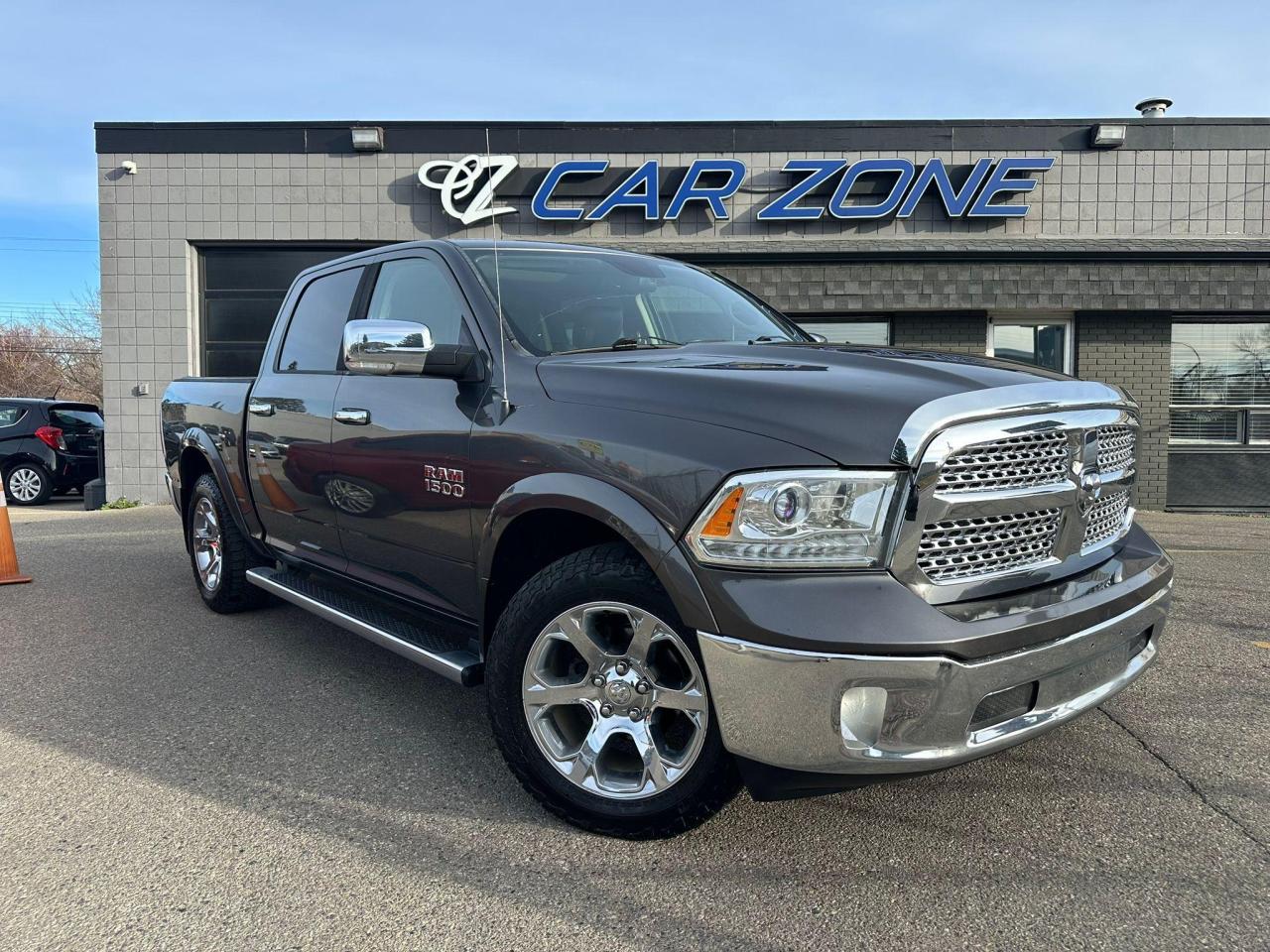 <p>Looking for a reliable and rugged pickup truck thats loaded with features? Look no further than this 2016 RAM 1500 4WD Crew Cab Laramie from Car Zone. This grey beauty with black interior is powered by a powerful 8-cylinder engine and comes equipped with an automatic transmission for smooth shifting. Whether youre hauling cargo or tackling tough terrain, this 4-wheel drive truck is ready for the challenge.</p><p>This Laramie trim level offers a luxurious and comfortable ride, with features like POWER SUNROOF, leather seats, heated and cooled seats, heated steering wheel, and a premium sound system. Youll enjoy the convenience of keyless entry, push-button start, GPS navigation, and a rearview camera. Safety is paramount, with features such as anti-lock brakes, forward collision warning, and a comprehensive airbag system. This RAM 1500 has been well-maintained with 204,565 km on the odometer and is ready for its next adventure.</p><p>Here are five of this trucks most sizzle-worthy features:</p><ul><li><strong>Heated and Cooled Seats:</strong> Enjoy ultimate comfort year-round with heated seats for the cold Canadian winters and cooled seats for those hot summer days.</li><li><strong>Heated Steering Wheel:</strong> Stay warm and comfortable even on the coldest days with a heated steering wheel.</li><li><strong>Premium Sound System:</strong> Enjoy your favorite music and podcasts in crystal-clear audio quality with a premium sound system.</li><li><strong>GPS Navigation:</strong> Never get lost again with a built-in GPS navigation system that guides you to your destination.</li><li><strong>Rearview Camera:</strong> Enjoy added peace of mind and confidence when backing up with a rearview camera.</li></ul><p>Visit our website for the <span style=color: #3598db;><strong>CARFAX LINK</strong></span></p><p>Looking for Your Dream Car? Call Car Zone Today!</p><p><span style=font-family: Inter, ui-sans-serif, system-ui, -apple-system, BlinkMacSystemFont, Segoe UI, Roboto, Helvetica Neue, Arial, Noto Sans, sans-serif, Apple Color Emoji, Segoe UI Emoji, Segoe UI Symbol, Noto Color Emoji;>Thanks for viewing our Car Zone inventory. All of our vehicles come fully detailed with a Carfax and a mechanical fitness assessment. Drive this home today! Easy financing options. All credit welcome. <strong><span style=color: #3598db;>APPLY NOW</span> </strong>We even take trades. Same day approvals at <strong><span style=color: #3598db;>CARZONECALGARY</span></strong> or visit us in person at 2036 36 Street SE Calgary for a hassle free test drive. Let our friendly team of experts book an appointment with you and show you the Car Zone difference! AMVIC licensed dealer. </span></p>