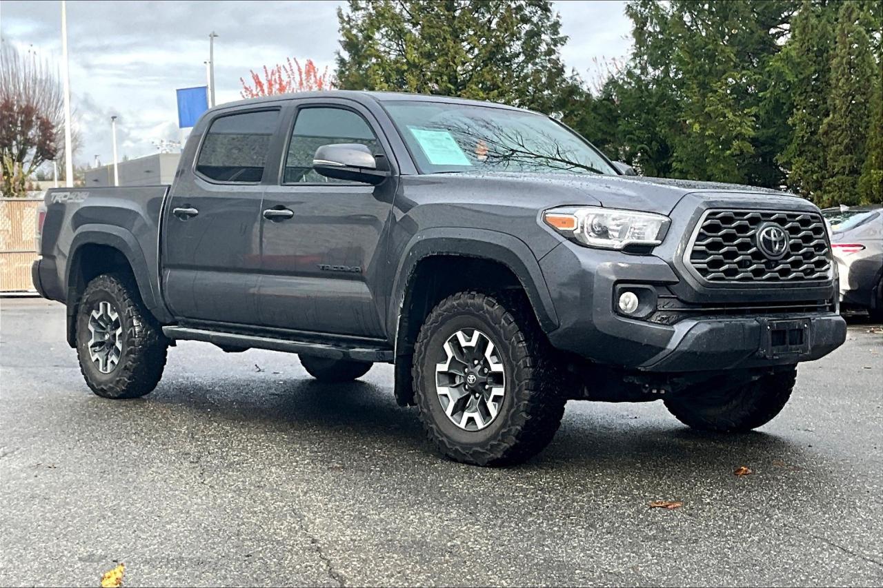 Conquer any terrain with the 2023 Toyota Tacoma 4X4 Double Cab TRD Off-Road Premium, a rugged yet refined midsize truck built for adventure. Equipped with advanced off-road features like Multi-Terrain Select, Crawl Control, and Bilstein shocks, this trim excels where others can’t. Inside, premium upgrades like leather-trimmed seats, a power sunroof, and an advanced infotainment system with navigation elevate comfort and convenience. Whether tackling trails or city streets, the Tacoma TRD Off-Road Premium offers unparalleled versatility. Visit us today to experience the perfect balance of power, capability, and style. Schedule your test drive now!   At OpenRoad Toyota Abbotsford, we take the stress out of buying a used car by providing you with our TruePrice from the start! You will have peace of mind knowing you got our best price up-front, without the hassle of negotiating.  All OpenRoad Certified pre-owned vehicles must pass an extremely thorough 153-point safety inspection for your peace of mind. All vehicles will have a Carfax verified history report, as well as a safety inspection report and breakdown of all work performed. We pride ourselves in our transparency, and wish to provide you with all the info you need to be confident in your vehicle purchase. Give us a call or visit our showroom at 30210 Automall Dr in Abbotsford, BC!   Prices subject to $499 Documentation Fee, $499 Lease/Finance Fee, and applicable taxes. Dealer #40643