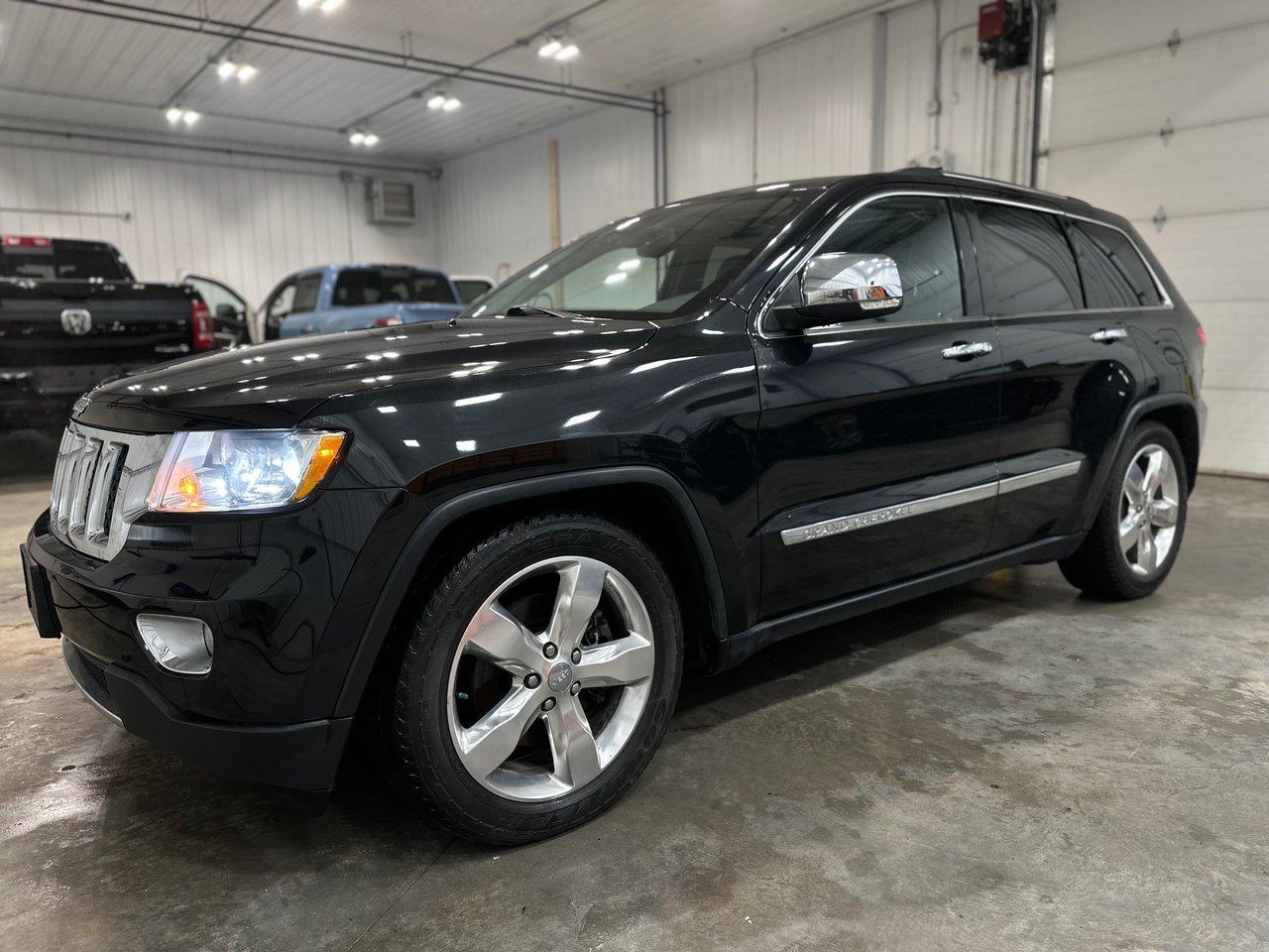 <p>AMERIKAL AUTO  3160 WILKES AVENUE, WINNIPEG MANITOBA.</p><p>ALL PREMIUM PRE-OWNED VEHICLES.</p><p>PLEASE CALL THE NUMBER OR TEXT <a href=tel:2049905659>2049905659</a> PRIOR TO COMING IN.</p><p>2012 JEEP GRAND CHEROKEE OVERLAND 4X4 FULLY LOADED 5.7L HEMI MOTOR 8 CYLINDER 5 passenger with 127,500kms, automatic transmission, keyless entry, FACTORY COMMAND START, HEATED FRONT AND REAR LEATHER SEATING, SUNROOF, traction control, cruise control, power locks, power steering, power windows, GPS/NAVIGATION SYSTEM, AM/FM/CD/MP3/AUX/USB/BLUETOOTH player, CLEAN TITLE, COMES SAFETIED, AND WILL BE READY TO GO and much more! We at AMERIKAL AUTO are professional, and we offer a no-pressure, hassle-free, and family-oriented environment. We are here to help you. Bank Financing Available! Only $15,999 + taxes. Dealers permit #4780.</p><p>Every vehicle we have comes with a Manitoba Certified Safety Inspection and a carproof/carfax history report.</p>