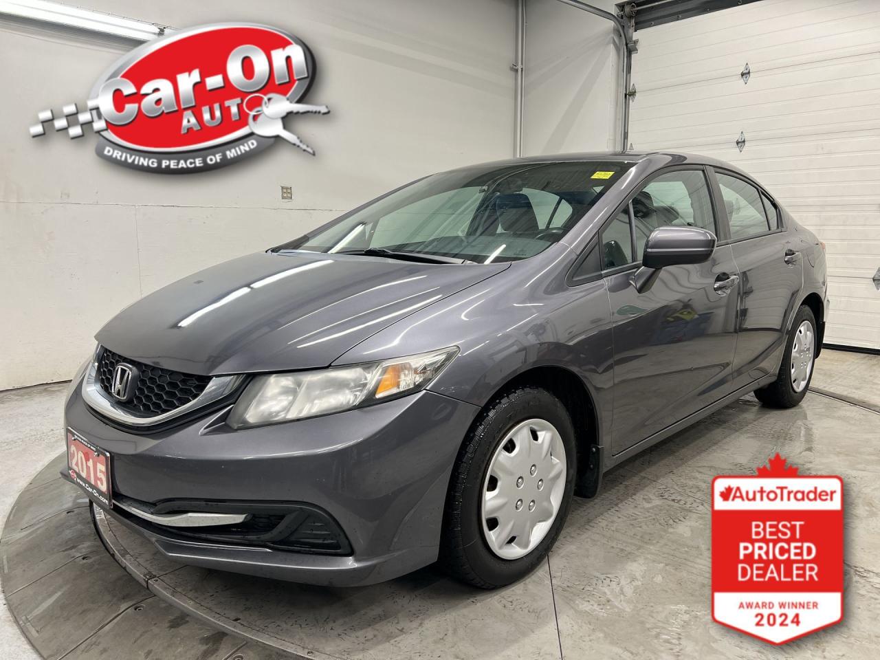 LOW KMS!! 5-Speed manual LX w/ heated seats, backup camera, Bluetooth, keyless entry, air conditioning, power windows, power locks, power mirrors, cruise control and Econ drive mode!!!