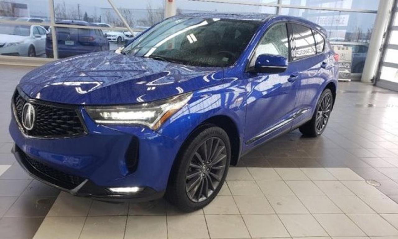 Recent Arrival!**MARKET VALUE PRICING**Discover the 2021 Acura RDX A-Spec, featuring a turbocharged 2.0L engine, Super Handling All-Wheel Drive (SH-AWD), and a 10.2-inch HD display with Apple CarPlay, Android Auto, and premium ELS Studio audio system. The 2021 Acura RDX A-Spec combines sporty performance with luxury and advanced technology. Powered by a turbocharged 2.0L engine and equipped with Super Handling All-Wheel Drive (SH-AWD), the RDX A-Spec delivers a dynamic and responsive driving experience. The A-Spec trim adds aggressive styling cues, including 20-inch Shark Gray alloy wheels, dark chrome accents, and a unique front and rear fascia. Inside, the RDX A-Spec offers a luxurious and tech-forward cabin with a 10.2-inch HD display, Apple CarPlay, Android Auto, and the premium ELS Studio audio system. The interior features sporty touches like leather and Ultrasuede-trimmed seats, a flat-bottom steering wheel, and red ambient lighting, creating a sophisticated and engaging environment. Safety is also a priority, with AcuraWatch advanced safety features, including adaptive cruise control, lane-keeping assist, and a surround-view camera system, ensuring peace of mind on every journey.2021 Acura RDX A-Spec Package SH-AWD SH-AWD Apex Blue Pearl 4D Sport Utility AWD 2.0L 16V DOHC 10-Speed AutomaticAs the only Acura dealer in the province - and on PEI - we make sure to bring you the very best selection of used vehicles possible. From the sleek and stylish ILX, RLX, and TLX, to sporty SUVs like the MDX and RDX, or any other make weve got you covered.Steele Auto Group is the most diversified group of automobile dealerships in Atlantic Canada, with 51 dealerships selling 28 brands and an employee base of well over 2300.