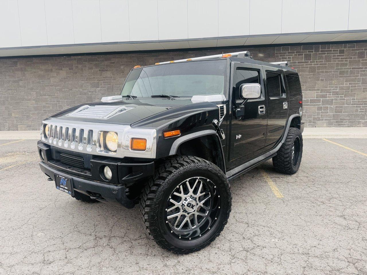 <p>NEW ARRIVAL!!</p><p>2003 Hummer H2 SUV!!</p><p>**XD RIMS W/ 37 TIRES**</p><p>**LIFTED**</p><p>6.0L V8 MOTOR, AUTOMATIC TRANSMISSION, 4X4, LEATHER INTERIOR, ROOF RACKS, TOW HITCH, MEMORY SEATS, HEATED FRONT SEATS, BOSE SPEAKERS, FOLD DOWN REAR SEATS AND MUCH MORE!!</p><p>**VEHICLE IS BEING SOLD AS-IS**</p><p>**ADDITIONAL $1,299 FOR CERTIFICATION**</p><p style=-webkit-text-stroke-width: 0px; background-color: #ffffff; border: 0px; box-sizing: border-box; color: #3e4153; font-family: Larsseit, Arial, sans-serif; font-feature-settings: inherit; font-kerning: inherit; font-optical-sizing: inherit; font-size: 16px; font-stretch: inherit; font-style: normal; font-variant-alternates: inherit; font-variant-caps: normal; font-variant-east-asian: inherit; font-variant-ligatures: normal; font-variant-numeric: inherit; font-variant-position: inherit; font-variation-settings: inherit; font-weight: 400; letter-spacing: normal; line-height: inherit; margin: 1em 0px; orphans: 2; padding: 0px; text-align: start; text-decoration-color: initial; text-decoration-style: initial; text-decoration-thickness: initial; text-indent: 0px; text-transform: none; white-space: pre-line; widows: 2; word-spacing: 0px;>FINANCING AND LEASING AVAILABLE.</p><p style=-webkit-text-stroke-width: 0px; background-color: #ffffff; border: 0px; box-sizing: border-box; color: #3e4153; font-family: Larsseit, Arial, sans-serif; font-feature-settings: inherit; font-kerning: inherit; font-optical-sizing: inherit; font-size: 16px; font-stretch: inherit; font-style: normal; font-variant-alternates: inherit; font-variant-caps: normal; font-variant-east-asian: inherit; font-variant-ligatures: normal; font-variant-numeric: inherit; font-variant-position: inherit; font-variation-settings: inherit; font-weight: 400; letter-spacing: normal; line-height: inherit; margin: 1em 0px; orphans: 2; padding: 0px; text-align: start; text-decoration-color: initial; text-decoration-style: initial; text-decoration-thickness: initial; text-indent: 0px; text-transform: none; white-space: pre-line; widows: 2; word-spacing: 0px;>EXTENDED WARRANTY OPTIONS AVAILABLE.</p><p style=-webkit-text-stroke-width: 0px; background-color: #ffffff; border: 0px; box-sizing: border-box; color: #3e4153; font-family: Larsseit, Arial, sans-serif; font-feature-settings: inherit; font-kerning: inherit; font-optical-sizing: inherit; font-size: 16px; font-stretch: inherit; font-style: normal; font-variant-alternates: inherit; font-variant-caps: normal; font-variant-east-asian: inherit; font-variant-ligatures: normal; font-variant-numeric: inherit; font-variant-position: inherit; font-variation-settings: inherit; font-weight: 400; letter-spacing: normal; line-height: inherit; margin: 1em 0px; orphans: 2; padding: 0px; text-align: start; text-decoration-color: initial; text-decoration-style: initial; text-decoration-thickness: initial; text-indent: 0px; text-transform: none; white-space: pre-line; widows: 2; word-spacing: 0px;>All vehicles come with a required $10 OMVIC FEE- as well as a $250 Administration fee.</p><p style=-webkit-text-stroke-width: 0px; background-color: #ffffff; border: 0px; box-sizing: border-box; color: #3e4153; font-family: Larsseit, Arial, sans-serif; font-feature-settings: inherit; font-kerning: inherit; font-optical-sizing: inherit; font-size: 16px; font-stretch: inherit; font-style: normal; font-variant-alternates: inherit; font-variant-caps: normal; font-variant-east-asian: inherit; font-variant-ligatures: normal; font-variant-numeric: inherit; font-variant-position: inherit; font-variation-settings: inherit; font-weight: 400; letter-spacing: normal; line-height: inherit; margin: 1em 0px; orphans: 2; padding: 0px; text-align: start; text-decoration-color: initial; text-decoration-style: initial; text-decoration-thickness: initial; text-indent: 0px; text-transform: none; white-space: pre-line; widows: 2; word-spacing: 0px;>All certified vehicles come with a 36 day safety warranty.</p><p style=-webkit-text-stroke-width: 0px; background-color: #ffffff; border: 0px; box-sizing: border-box; color: #3e4153; font-family: Larsseit, Arial, sans-serif; font-feature-settings: inherit; font-kerning: inherit; font-optical-sizing: inherit; font-size: 16px; font-stretch: inherit; font-style: normal; font-variant-alternates: inherit; font-variant-caps: normal; font-variant-east-asian: inherit; font-variant-ligatures: normal; font-variant-numeric: inherit; font-variant-position: inherit; font-variation-settings: inherit; font-weight: 400; letter-spacing: normal; line-height: inherit; margin: 1em 0px; orphans: 2; padding: 0px; text-align: start; text-decoration-color: initial; text-decoration-style: initial; text-decoration-thickness: initial; text-indent: 0px; text-transform: none; white-space: pre-line; widows: 2; word-spacing: 0px;>*All prices are plus HST & Licensing*</p><p style=-webkit-text-stroke-width: 0px; background-color: #ffffff; border: 0px; box-sizing: border-box; color: #3e4153; font-family: Larsseit, Arial, sans-serif; font-feature-settings: inherit; font-kerning: inherit; font-optical-sizing: inherit; font-size: 16px; font-stretch: inherit; font-style: normal; font-variant-alternates: inherit; font-variant-caps: normal; font-variant-east-asian: inherit; font-variant-ligatures: normal; font-variant-numeric: inherit; font-variant-position: inherit; font-variation-settings: inherit; font-weight: 400; letter-spacing: normal; line-height: inherit; margin: 1em 0px; orphans: 2; padding: 0px; text-align: start; text-decoration-color: initial; text-decoration-style: initial; text-decoration-thickness: initial; text-indent: 0px; text-transform: none; white-space: pre-line; widows: 2; word-spacing: 0px;>Auto View is located at 590 South Service Road Stoney Creek, only minutes off the QEW Exit 83 Fruitland Road!</p><p style=-webkit-text-stroke-width: 0px; background-color: #ffffff; border: 0px; box-sizing: border-box; color: #3e4153; font-family: Larsseit, Arial, sans-serif; font-feature-settings: inherit; font-kerning: inherit; font-optical-sizing: inherit; font-size: 16px; font-stretch: inherit; font-style: normal; font-variant-alternates: inherit; font-variant-caps: normal; font-variant-east-asian: inherit; font-variant-ligatures: normal; font-variant-numeric: inherit; font-variant-position: inherit; font-variation-settings: inherit; font-weight: 400; letter-spacing: normal; line-height: inherit; margin: 1em 0px; orphans: 2; padding: 0px; text-align: start; text-decoration-color: initial; text-decoration-style: initial; text-decoration-thickness: initial; text-indent: 0px; text-transform: none; white-space: pre-line; widows: 2; word-spacing: 0px;>Contact us VIA email, call, or text!</p><p style=-webkit-text-stroke-width: 0px; background-color: #ffffff; border: 0px; box-sizing: border-box; color: #3e4153; font-family: Larsseit, Arial, sans-serif; font-feature-settings: inherit; font-kerning: inherit; font-optical-sizing: inherit; font-size: 16px; font-stretch: inherit; font-style: normal; font-variant-alternates: inherit; font-variant-caps: normal; font-variant-east-asian: inherit; font-variant-ligatures: normal; font-variant-numeric: inherit; font-variant-position: inherit; font-variation-settings: inherit; font-weight: 400; letter-spacing: normal; line-height: inherit; margin: 1em 0px; orphans: 2; padding: 0px; text-align: start; text-decoration-color: initial; text-decoration-style: initial; text-decoration-thickness: initial; text-indent: 0px; text-transform: none; white-space: pre-line; widows: 2; word-spacing: 0px;>sales@autoview.ca</p><p style=-webkit-text-stroke-width: 0px; background-color: #ffffff; border: 0px; box-sizing: border-box; color: #3e4153; font-family: Larsseit, Arial, sans-serif; font-feature-settings: inherit; font-kerning: inherit; font-optical-sizing: inherit; font-size: 16px; font-stretch: inherit; font-style: normal; font-variant-alternates: inherit; font-variant-caps: normal; font-variant-east-asian: inherit; font-variant-ligatures: normal; font-variant-numeric: inherit; font-variant-position: inherit; font-variation-settings: inherit; font-weight: 400; letter-spacing: normal; line-height: inherit; margin: 1em 0px; orphans: 2; padding: 0px; text-align: start; text-decoration-color: initial; text-decoration-style: initial; text-decoration-thickness: initial; text-indent: 0px; text-transform: none; white-space: pre-line; widows: 2; word-spacing: 0px;>905-379-4206</p>