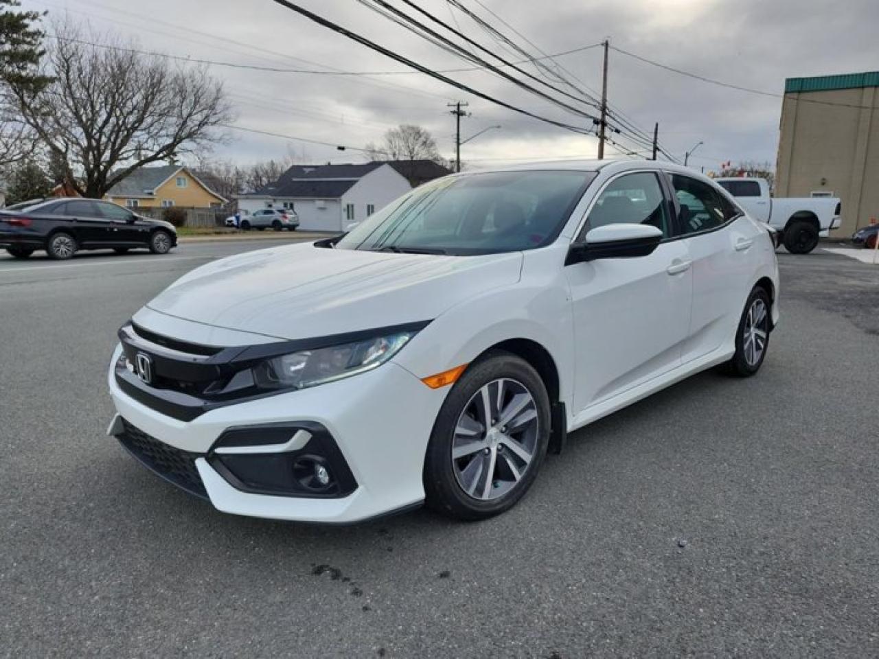 Come see this certified 2020 Honda Civic Hatchback LX Hatchback | Adaptive Cruise | Heated Seats | CarPlay + Android | Rear Camera | Alloy Wheels . Its Automatic transmission and 1.5 L engine will keep you going. This Honda Civic Hatchback comes equipped with these options: Reverse Camera, Air Conditioning, Adaptive Cruise Control, Heated Seats, Tilt Steering Wheel, Steering Radio Controls, Power Windows, Power Locks, Traction Control, and Power Mirrors. Stop by and visit us at Mark Wilsons Better Used Cars, 5055 Whitelaw Road, Guelph, ON N1H 6J4.60+ years of World Class Service!450+ Live Market Priced VEHICLES! ONE MASSIVE LOCATION!Free Local Delivery Available!FINANCING! - Better than bank rates! 6 Months No Payments available on approved credit OAC. Zero Down Available. We have expert licensed credit specialists to secure the best possible rate for you and keep you on budget ! We are your financing broker, let us do all the leg work on your behalf! Click the RED Apply for Financing button to the right to get started or drop in today!BAD CREDIT APPROVED HERE! - You dont need perfect credit to get a vehicle loan at Mark Wilsons Better Used Cars! We have a dedicated licensed team of credit rebuilding experts on hand to help you get the car of your dreams!WE LOVE TRADE-INS! - Top dollar trade-in values!SELL us your car even if you dont buy ours! HISTORY: Free Carfax report included.Certification included! No shady fees for safety!EXTENDED WARRANTY: Available30 DAY WARRANTY INCLUDED: 30 Days, or 3,000 km (mechanical items only). No Claim Limit (abuse not covered)5 Day Exchange Privilege! *(Some conditions apply)CASH PRICES SHOWN: Excluding HST and Licensing Fees.2019 - 2024 vehicles may be daily rentals. Please inquire with your Salesperson.We have made every reasonable attempt to ensure options are correct but please verify with your sales professional