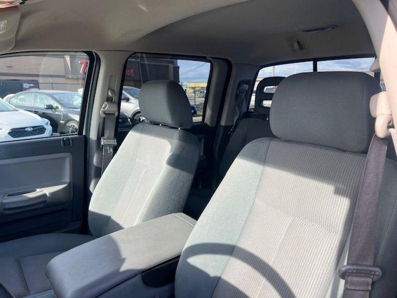 2005 Dodge Dakota Quad Cab 4WD SLT - Photo #12