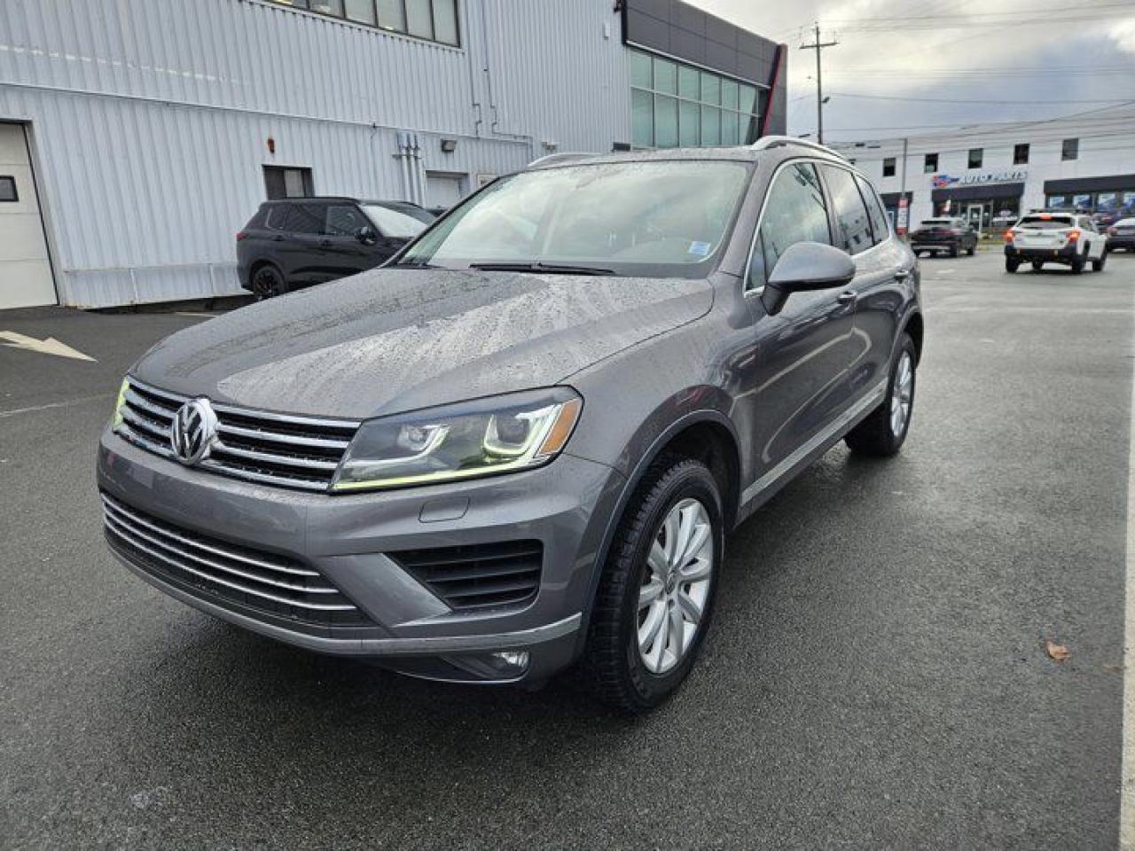 WHAT A GREAT CAR!2017 Volkswagen Touareg 3.6L 4Motion 4-Wheel Disc Brakes, Alloy wheels, Anti-whiplash front head restraints, Auto-dimming Rear-View mirror, Brake assist, Compass, Driver vanity mirror, Dual front side impact airbags, Front anti-roll bar, Front Bucket Seats, Front fog lights, Heated front seats, Leather Shift Knob, Occupant sensing airbag, Overhead console, Power driver seat, Power Liftgate, Power passenger seat, Power steering, Rear anti-roll bar, Rear window wiper, Regular Ride Suspension, Remote keyless entry, Split folding rear seat, Tachometer, Telescoping steering wheel, Tilt steering wheel, Traction control, Trip computer, Variably intermittent wipers.Red 2017 Volkswagen Touareg 3.6L 4Motion AWD 8-Speed Automatic with Tiptronic 3.6L V6 DGI DOHC 24V ULEV II 280hpSteele Mitsubishi has the largest and most diverse selection of preowned vehicles in HRM. Buy with confidence, knowing we use fair market pricing guaranteeing the absolute best value in all of our pre owned inventory!Steele Auto Group is one of the most diversified group of automobile dealerships in Canada, with 60 dealerships selling 29 brands and an employee base of well over 2300. Sales are up over last year and our plan going forward is to expand further into Atlantic Canada and the United States furthering our commitment to our Canadian customers as well as welcoming our new customers in the USA.