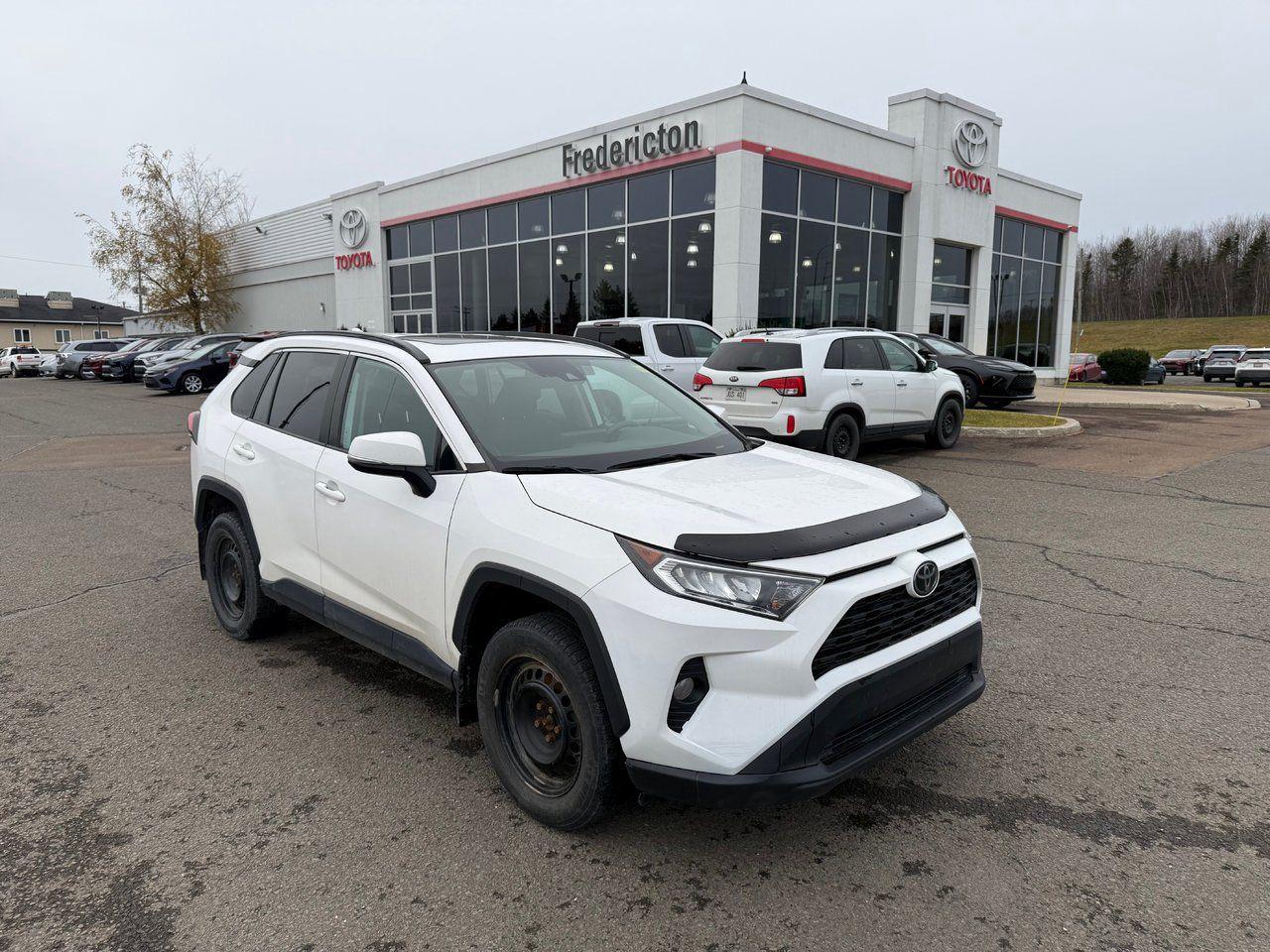 The 2020 Toyota RAV4 offers a comfortable and well-equipped interior with a heated, leather-wrapped steering wheel, dual-zone climate control, and heated front seats. The 7” touchscreen supports Apple CarPlay and Android Auto, while Toyota Safety Sense 2.0 includes features like Blind Spot Monitor, Lane Departure Alert, and Dynamic Radar Cruise Control. The exterior boasts LED headlights, fog lamps, 17 alloy wheels, and a power tilt/slide moonroof. Powered by a 2.5L 4-cylinder engine with VVT-i, the RAV4 combines efficiency with advanced safety features, making it a reliable and versatile compact SUV.

<span>Why choose to buy from Fredericton Toyota? When you buy from us, you’re not just a customer — you’re part of the family, and we’re committed to providing exceptional service every step of the way.</span>