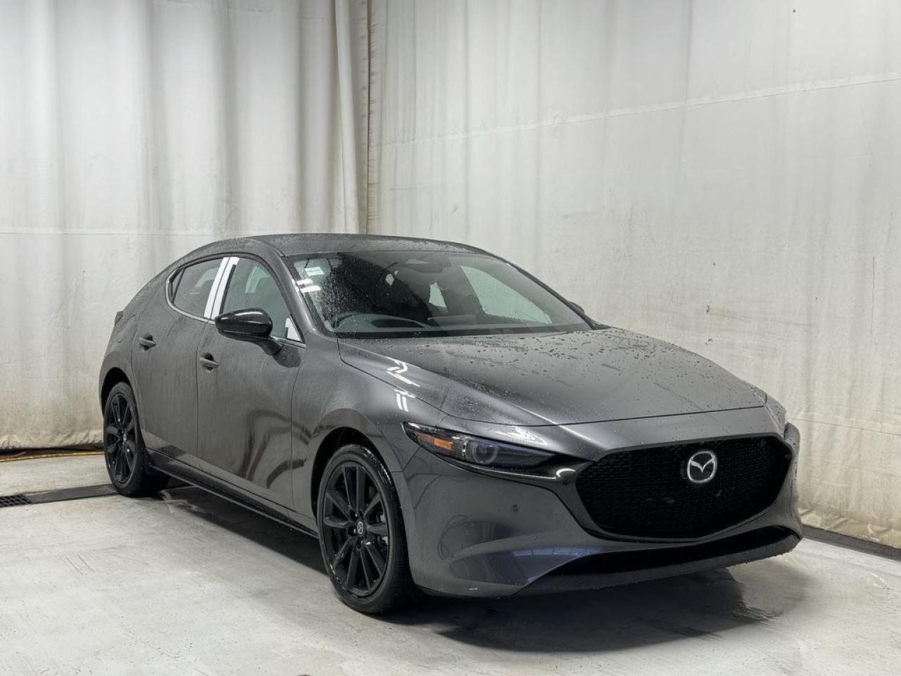 <p>NEW 2025 Mazda3 Sport GT Turbo AWD. Bluetooth, Available NAV, Leather Upholstery, 360° Cam, Tilt/Sliding Sunroof, Memory Driver Seat, Heated Seats, Adaptive Cruise Control, Heads-Up-Display, Heated Steering Wheel, Wireless Phone Charging, Wireless Apple CarPlay & Android Auto, USB/USB-C Input, Garage Door Opener, Auto Rain-Sensing Wipers, Electronic Parking Brake, Amazon Alexa, Paddle Shifter</p>  <p>Includes:</p> <p>i-ACTIVSENSE + Safety Features (Smart City Brake Support-Front, Day/Night Forward Pedestrian Detection, Driver Attention Alert, Rear Cross Traffic Alert, Mazda Radar Cruise Control With Stop & Go, Distance Recognition Support System, Lane-Keep Assist System, Lane Departure Warning System, Advanced Blind Spot Monitoring)</p>  <p>Drive our 2025 Mazda3 Sport GT Turbo and discover the advantages of standing out in Machine Gray Metallic! Motivated by a 2.5 Liter 4 Cylinder providing 191hp to a 6 Speed Automatic transmission for brisk acceleration. This All Wheel Drive hatchback also features sporty handling to command the curves, and it returns nearly approximately 6.7L/100km on the highway. A head-turning design helps our Mazda3 arrive in style with signature LED lighting, adaptive front lighting, a power sunroof, heated power mirrors, Black Metallic alloy wheels, and a black roof spoiler.</p>  <p>Our GT Turbo cabin lives up to its name by supplying upscale touches like heated leather front sport seats, eight-way power for the driver, a leather-wrapped steering wheel, dual-zone automatic climate control, keyless access, and pushbutton ignition. Well-equipped with infotainment tech, our Mazda3 makes life easier with a full color display, a console-mounted controller, full-color navigation, Android Auto/Apple CarPlay, Bluetooth, voice recognition, and a Bose sound system with high-end aluminum speaker grilles. The interior inspires you with intelligent versatility, too!</p>  <p>Mazda promotes safer journeys with a rearview camera, adaptive cruise control, automatic braking, a blind-spot monitor, a driver attention monitor, lane-keeping assistance, and more. You deserve a better ride, so check out our Mazda3 Sport GT Turbo today! We Know You Will Enjoy Your Test Drive Towards Ownership!</p>  <p>Call 587-409-5859 for more info or to schedule an appointment! Listed Pricing is valid for 72 hours. Financing is available, please see dealer for term availability and interest rates. AMVIC Licensed Business.</p>