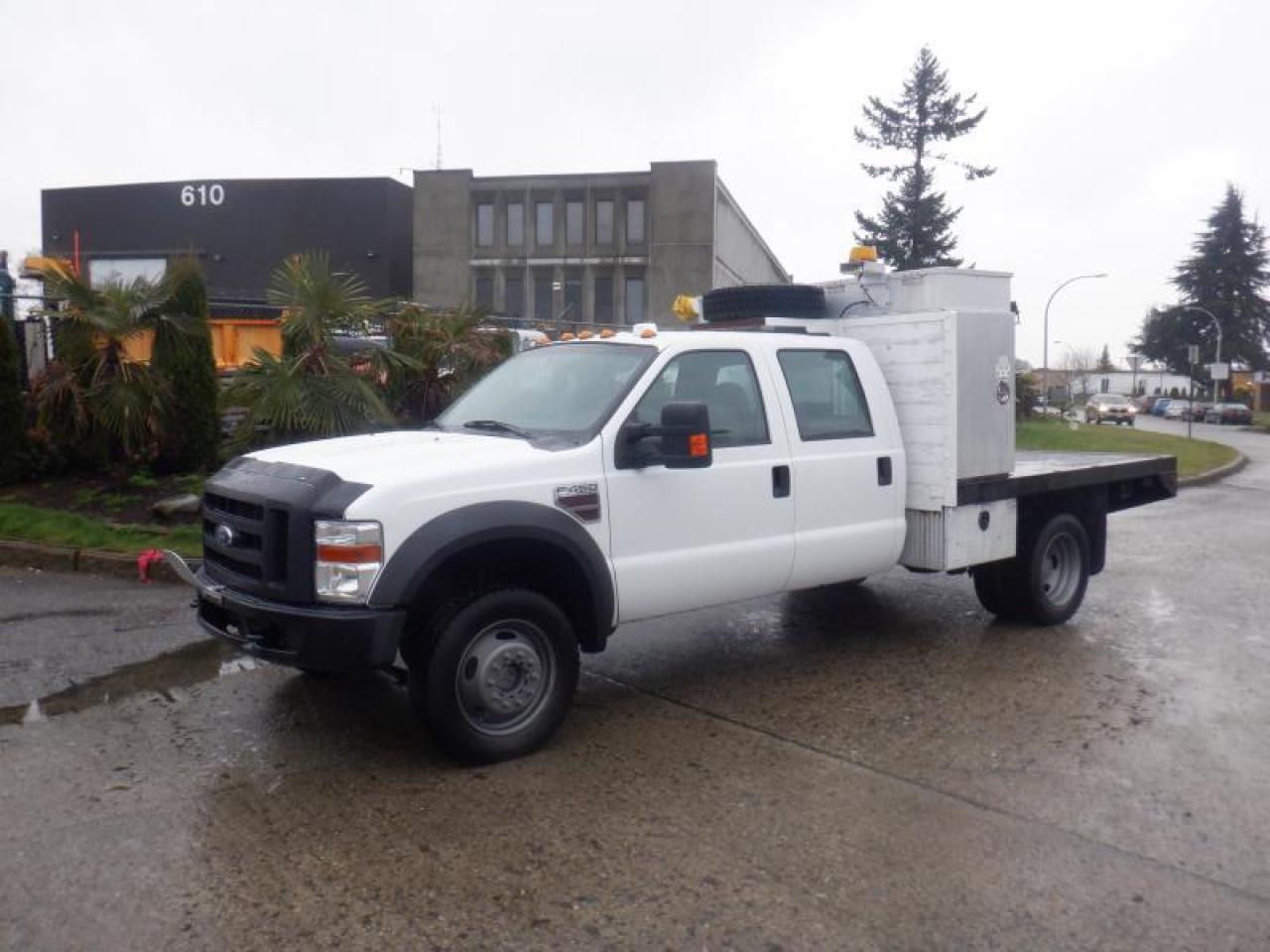 Used 2009 Ford F-450 SD Crew Cab 9 Foot Flat Deck 4WD Dually Diesel for sale in Burnaby, BC