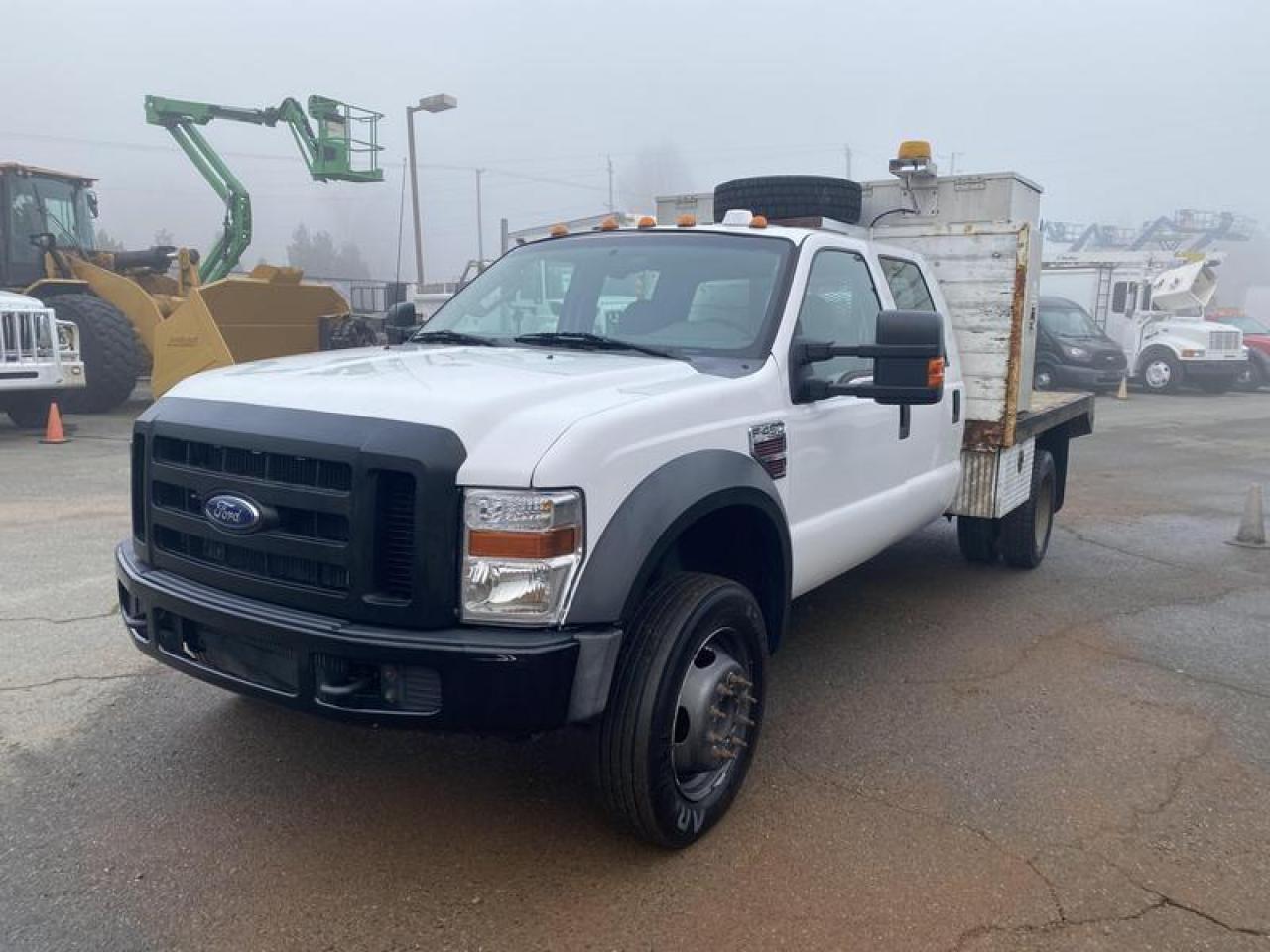 Used 2009 Ford F-450 SD Crew Cab 9 Foot Flat Deck 4WD Dually Diesel for sale in Burnaby, BC